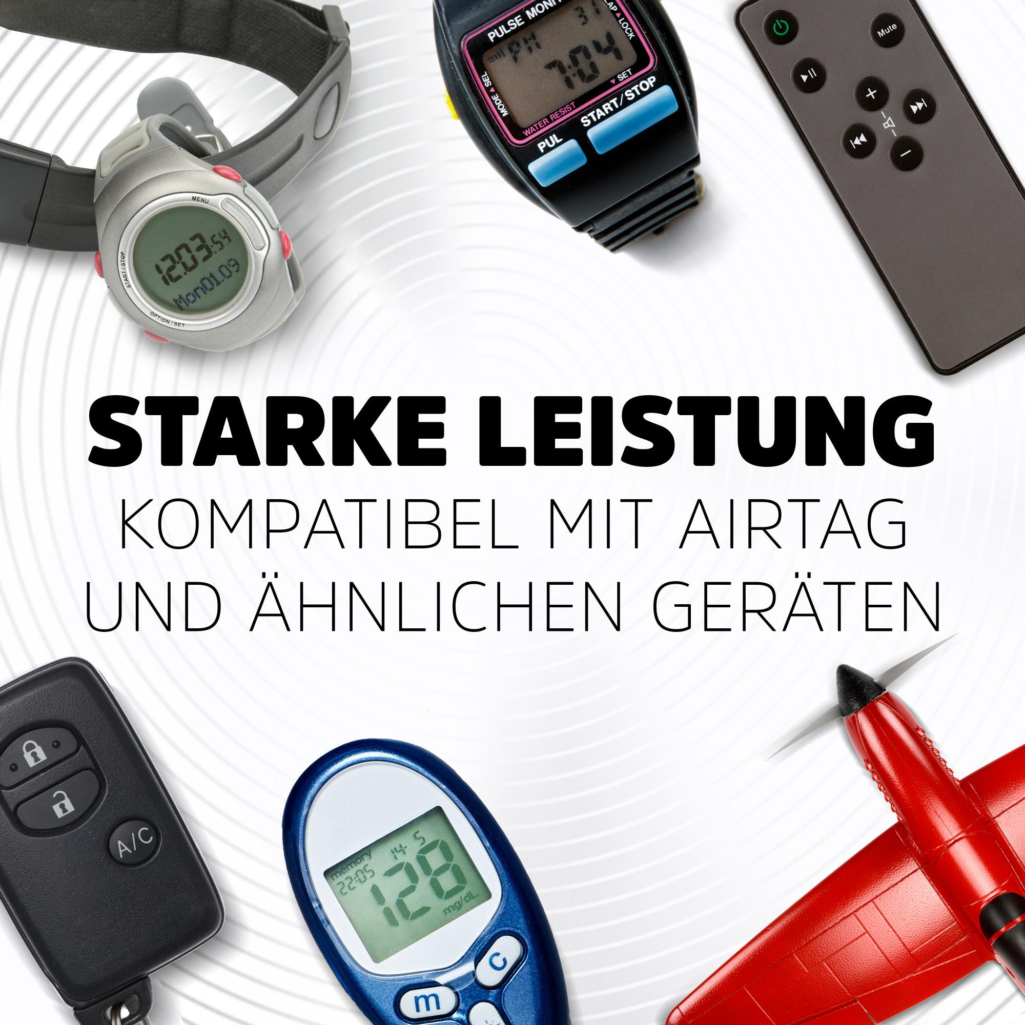 Das Bild zeigt verschiedene Geräte wie eine Uhr, Fernbedienung, Autoschlüssel, Blutzuckermessgerät und ein rotes Spielzeugflugzeug.