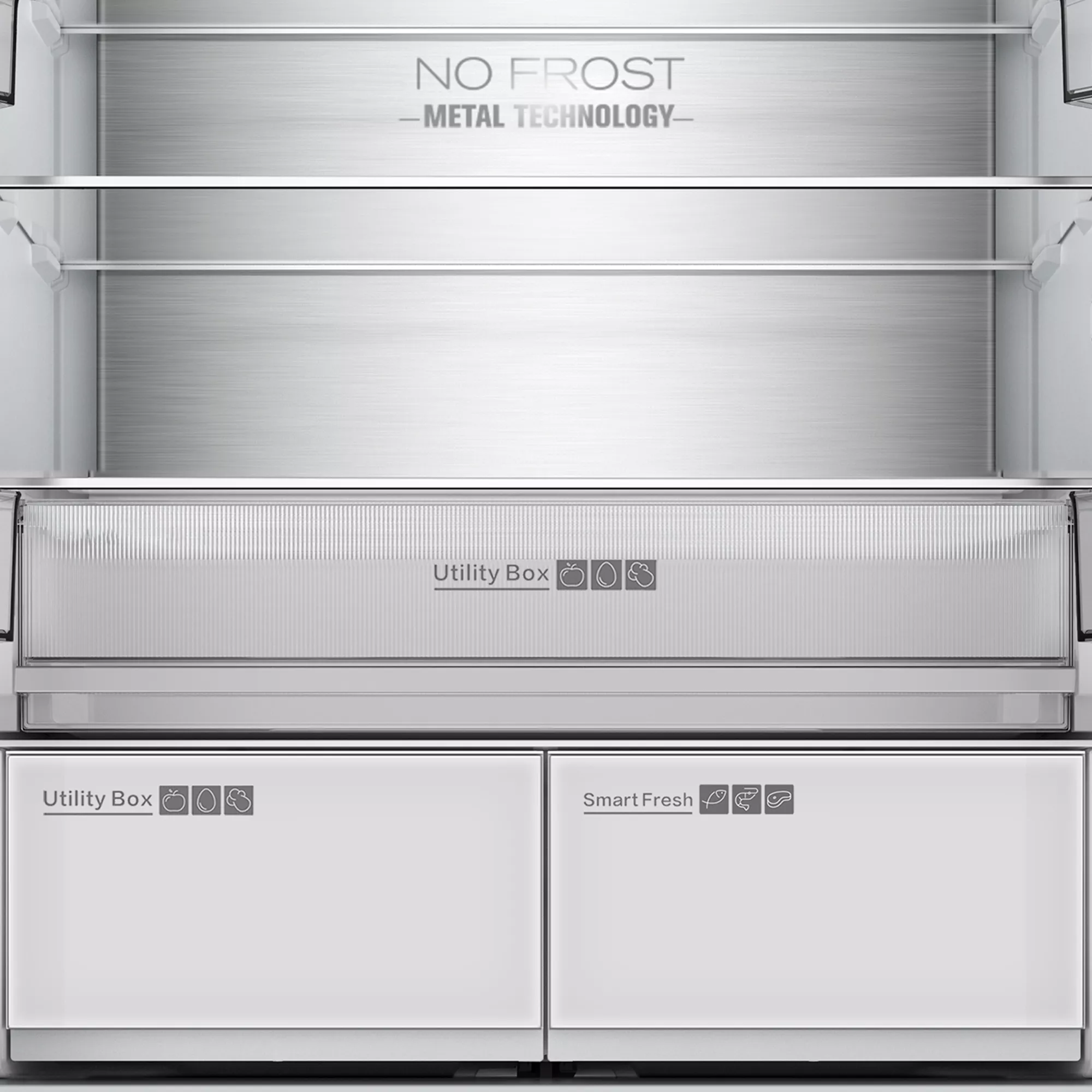 Interior de una nevera con interior metálico. Tiene estantes, una caja de utilidad y dos cajones con Smart Fresh.