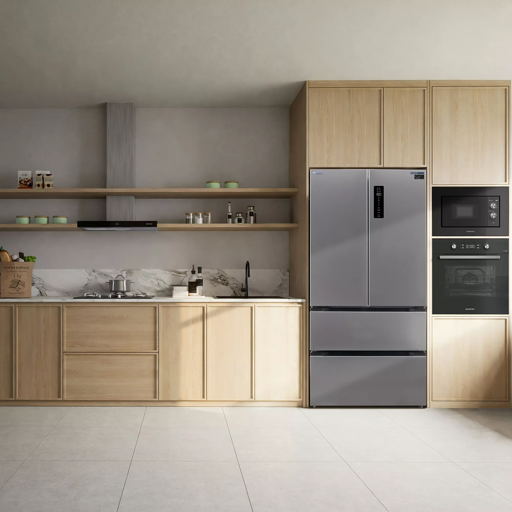 Una cocina moderna con nevera, microondas y horno. Se ven armarios de madera y encimeras de mármol.