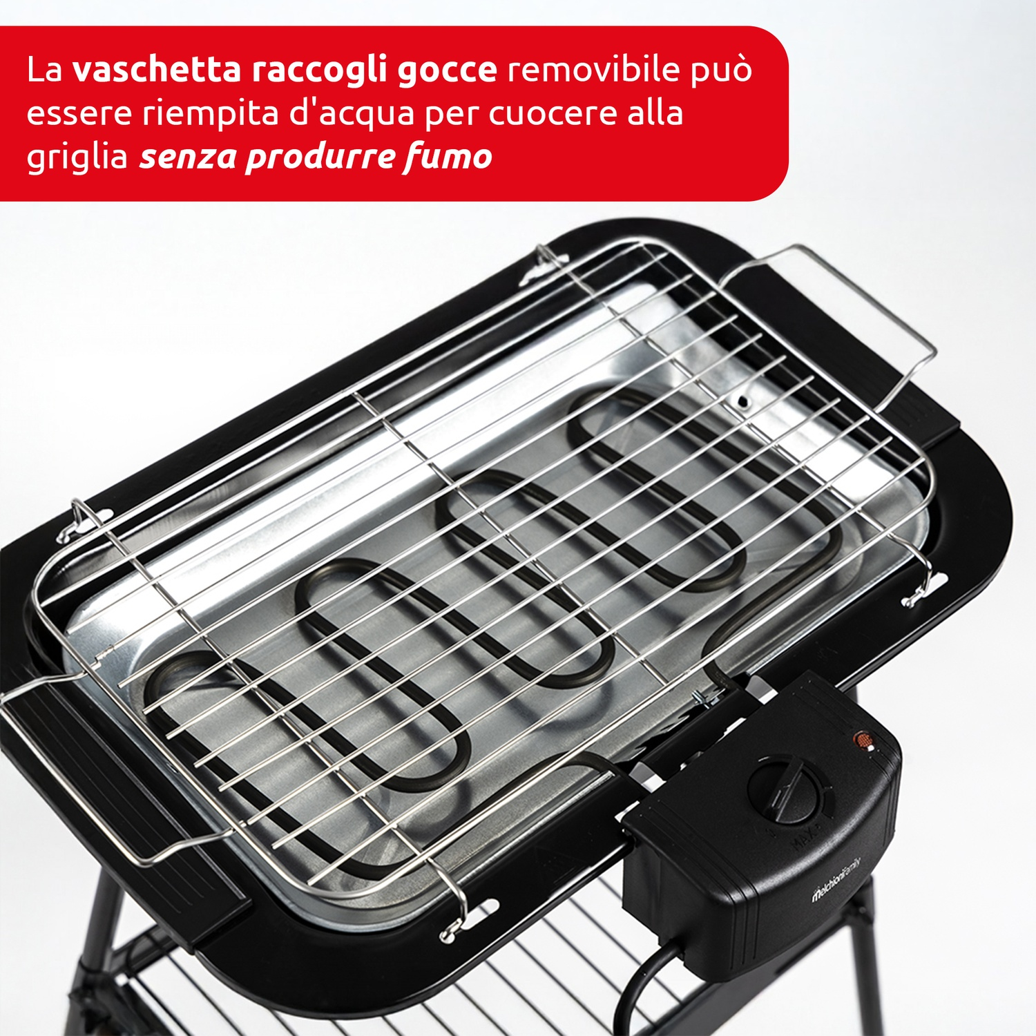 Griglia elettrica con telaio nero e vaschetta raccogli gocce rimovibile. L'elemento riscaldante è visibile. C'è una manopola di controllo a destra.