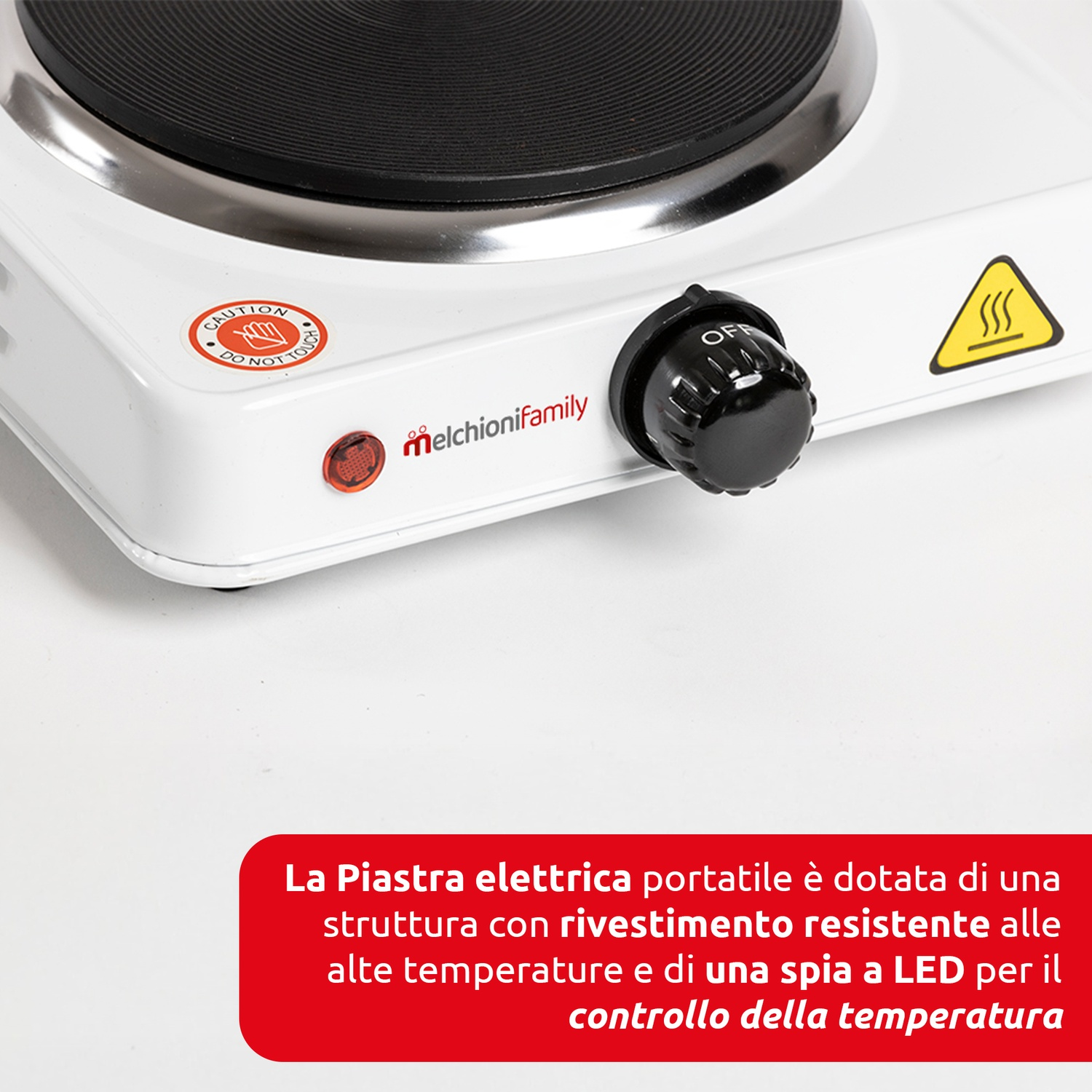 Un fornello elettrico portatile bianco con un elemento riscaldante nero e una manopola di controllo della temperatura. Visibile un segnale di avvertimento.