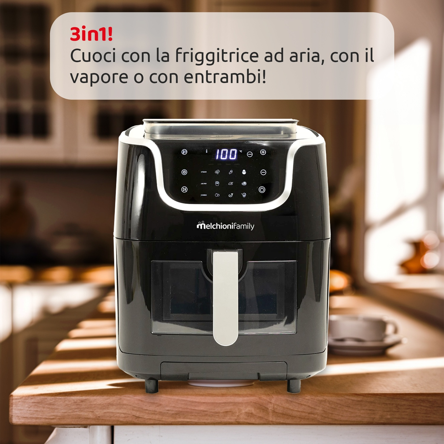 Friggitrice ad aria nera su bancone in legno. Testo: '3in1! Cuocere con friggitrice ad aria, vapore o entrambi!'. Display digitale '100'.