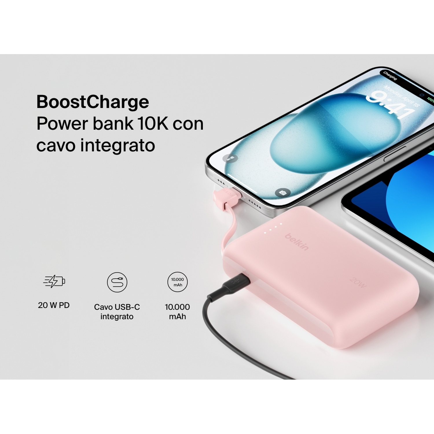 Un power bank Belkin rosa carica un iPhone. Il telefono mostra l'ora e lo stato di carica. Cavo USB-C collegato.