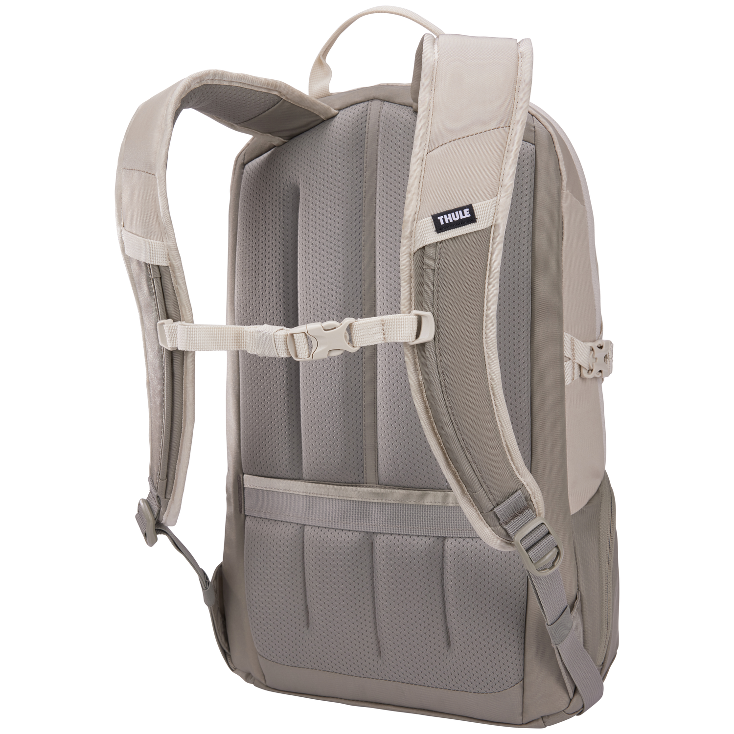 Backpack, light beige and gray, with padded straps and back panel. Features a Thule logo. Adjustable straps and buckles are visible.