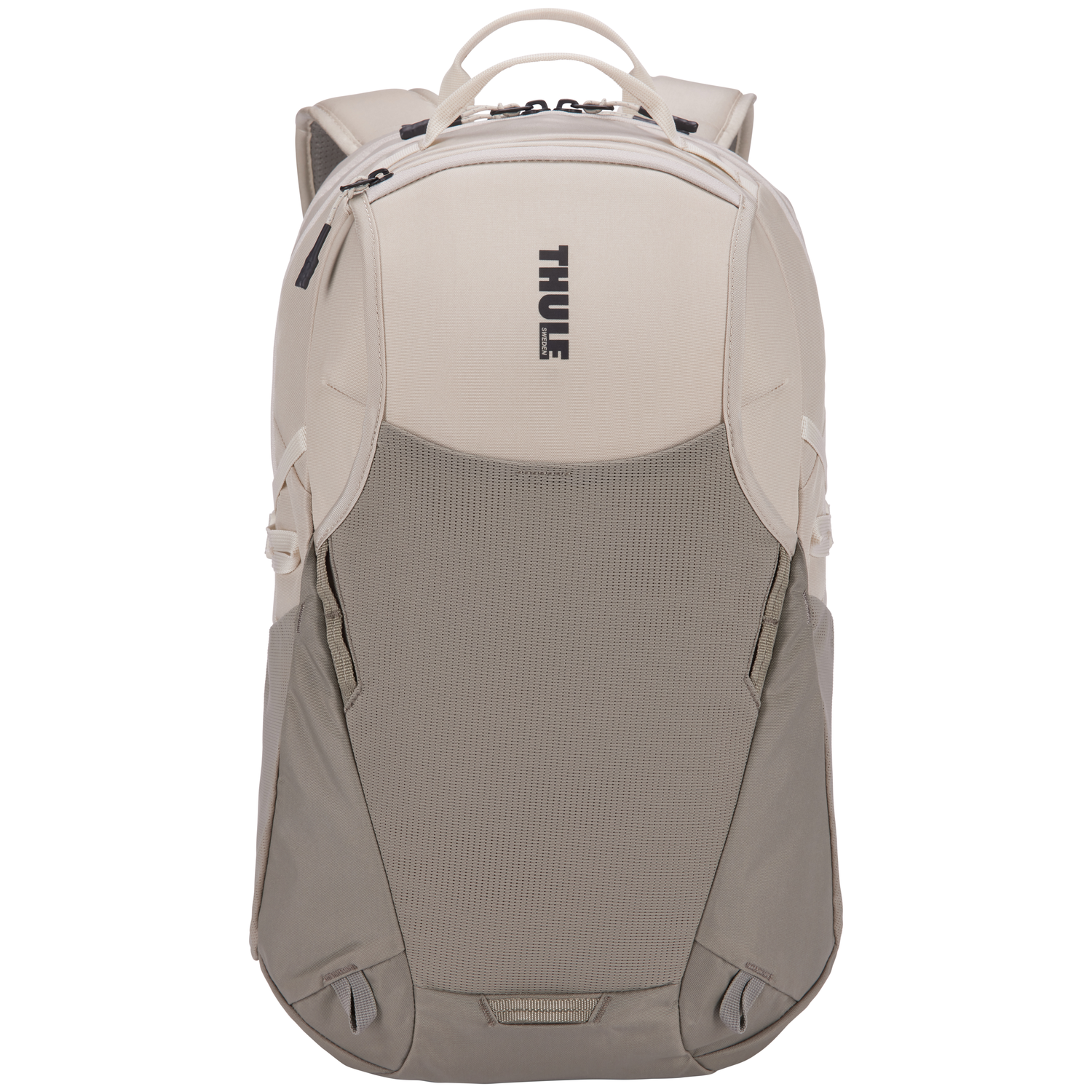 A beige and gray Thule backpack. It has a handle, zippers, and multiple compartments. The logo is visible on the front.