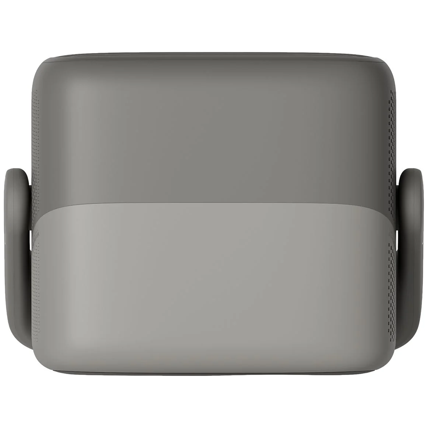 A gray rectangular device, likely a speaker or projector, with two rounded side handles. The top is darker gray than the bottom.