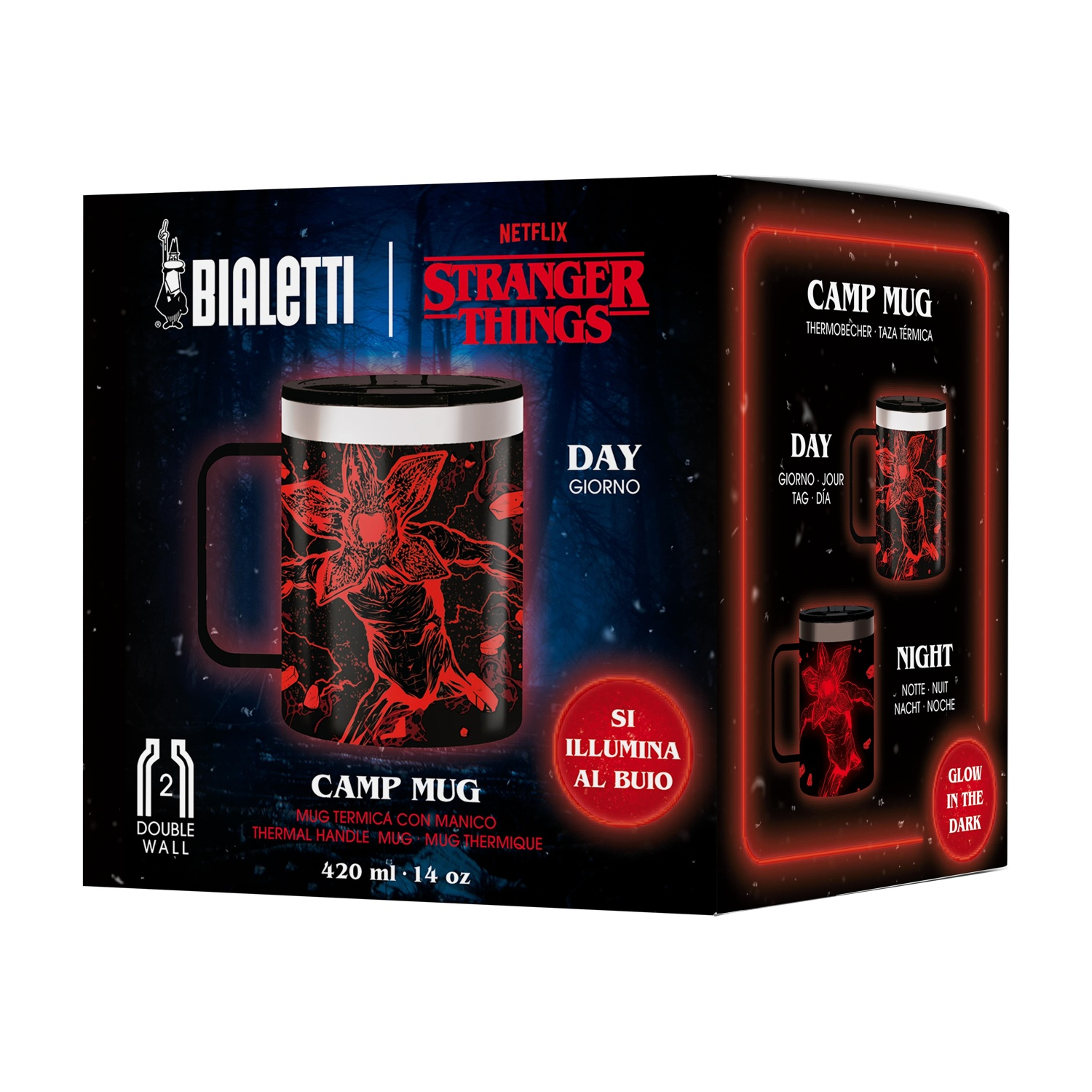 Una tazza da campeggio Bialetti a tema Stranger Things. La tazza è nera con un design Demogorgon rosso e si illumina al buio. La scatola mostra la tazza.