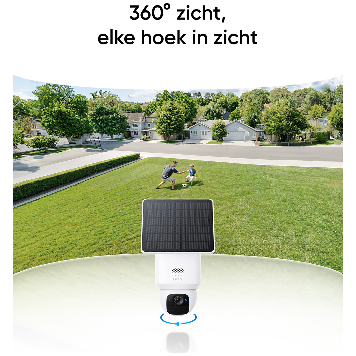 A surveillance camera with solar panel shows a man and a child playing soccer in a green yard with houses in the background.