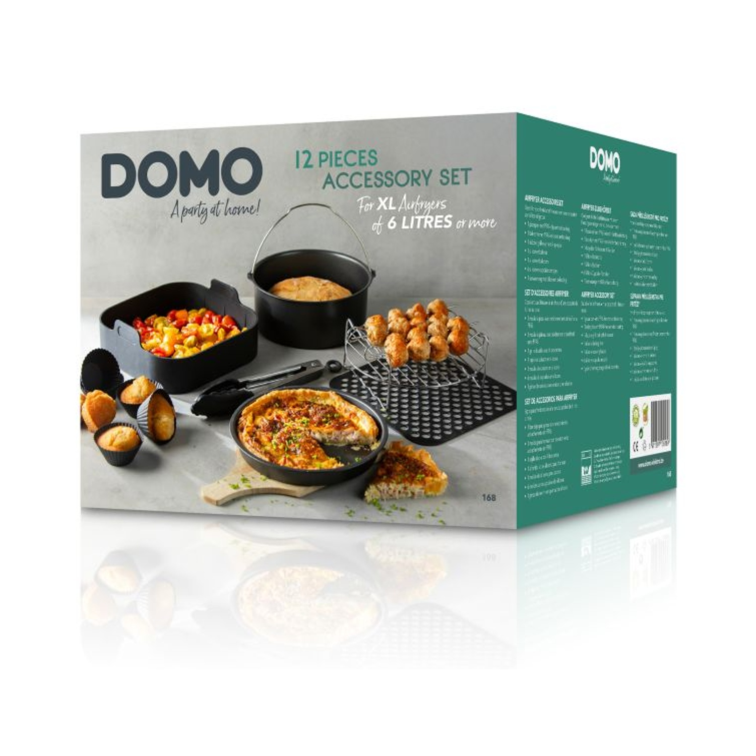 Scatola di accessori per friggitrice ad aria DOMO. Include accessori da cucina e piatti con cibo, su una superficie riflettente.