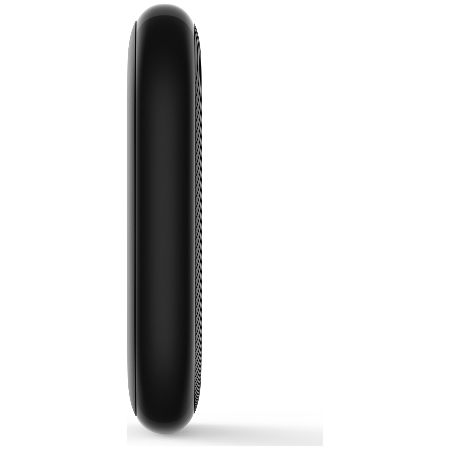 A black, rounded rectangular device is seen in profile. The right side has vertical lines. It sits on a white surface.