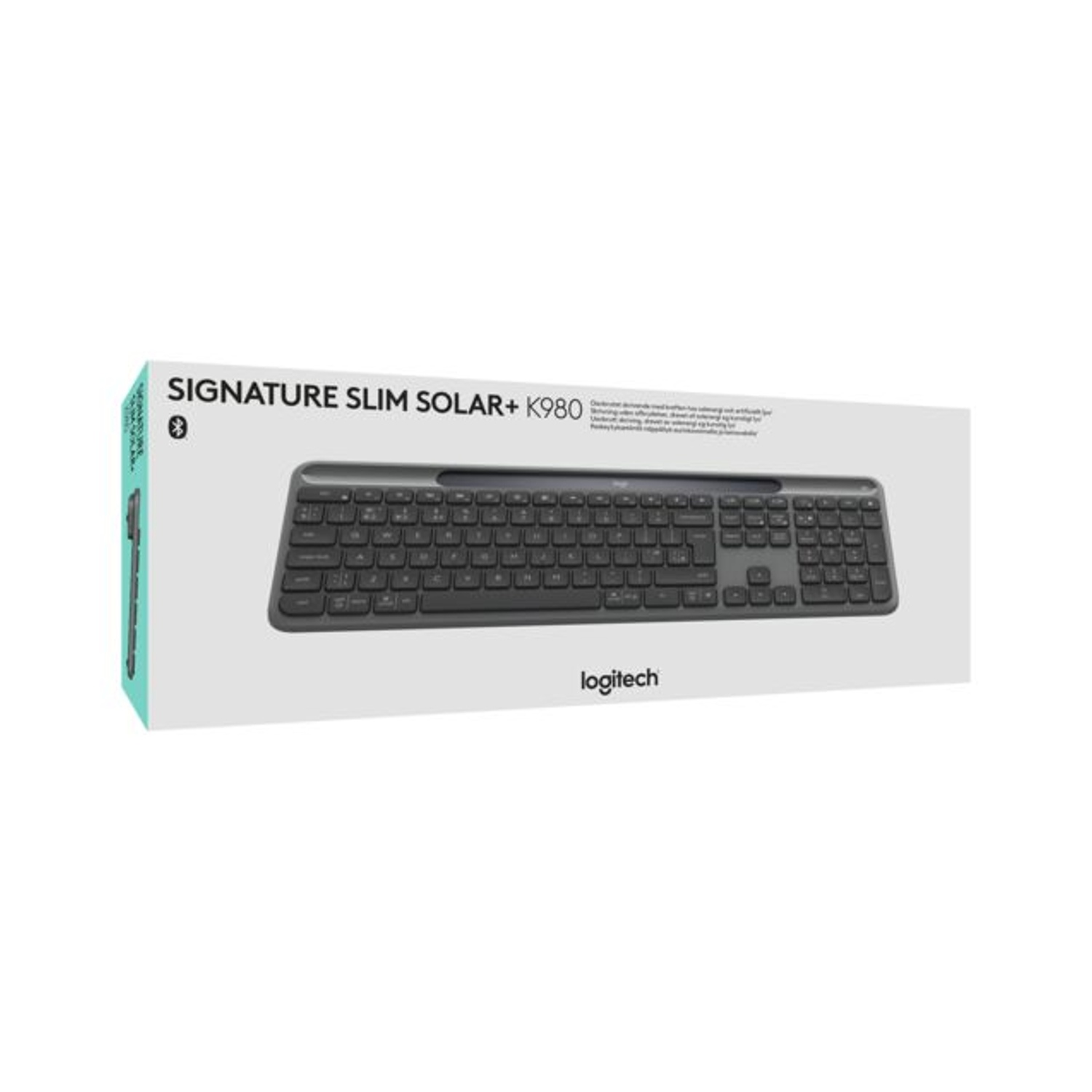 Una tastiera Logitech Signature Slim Solar+ K980 in una scatola bianca. La tastiera è nera. La scatola ha un lato verde.
