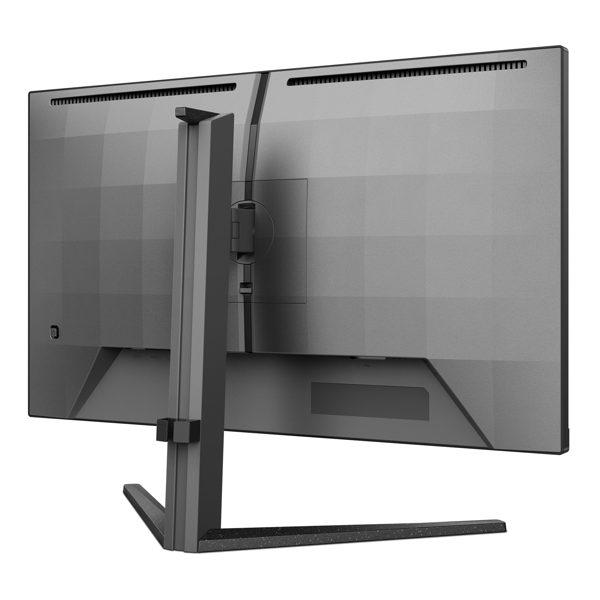 Se muestra la parte posterior de un monitor de computadora negro. Son visibles un brazo de soporte y una base. La superficie tiene un acabado texturizado.
