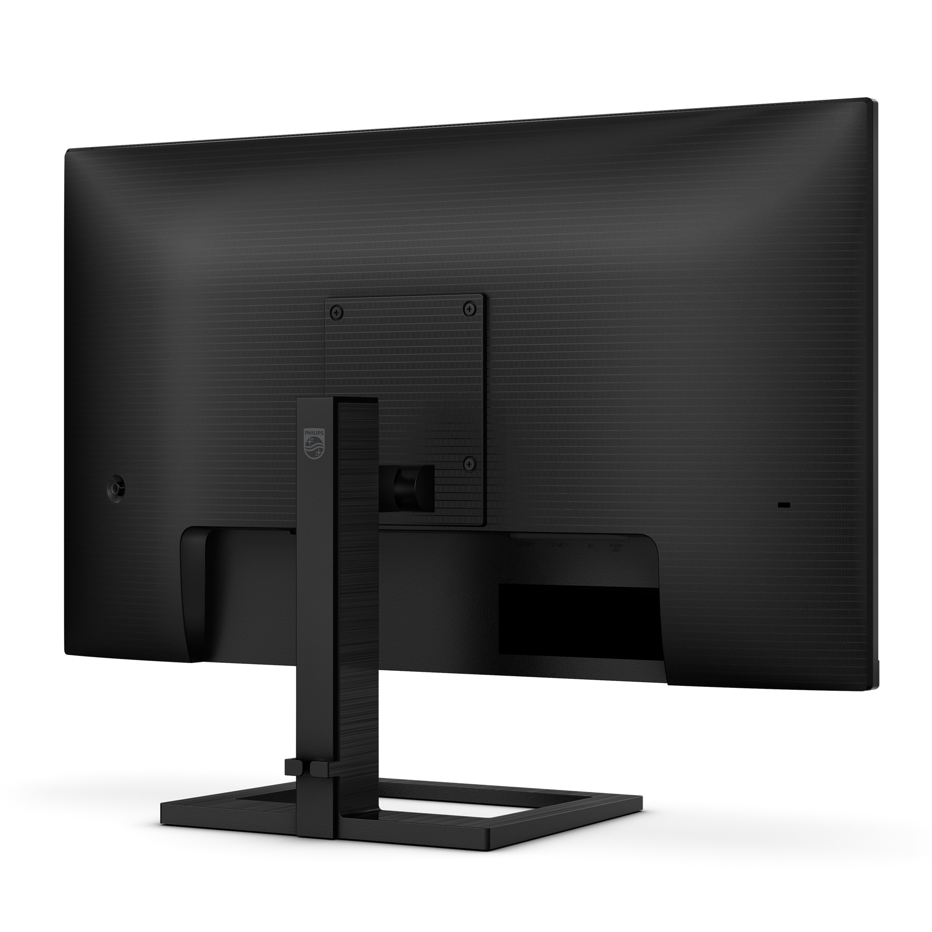 Vista trasera de un monitor de computadora negro. Tiene un soporte, un logotipo de Philips y varios puertos.