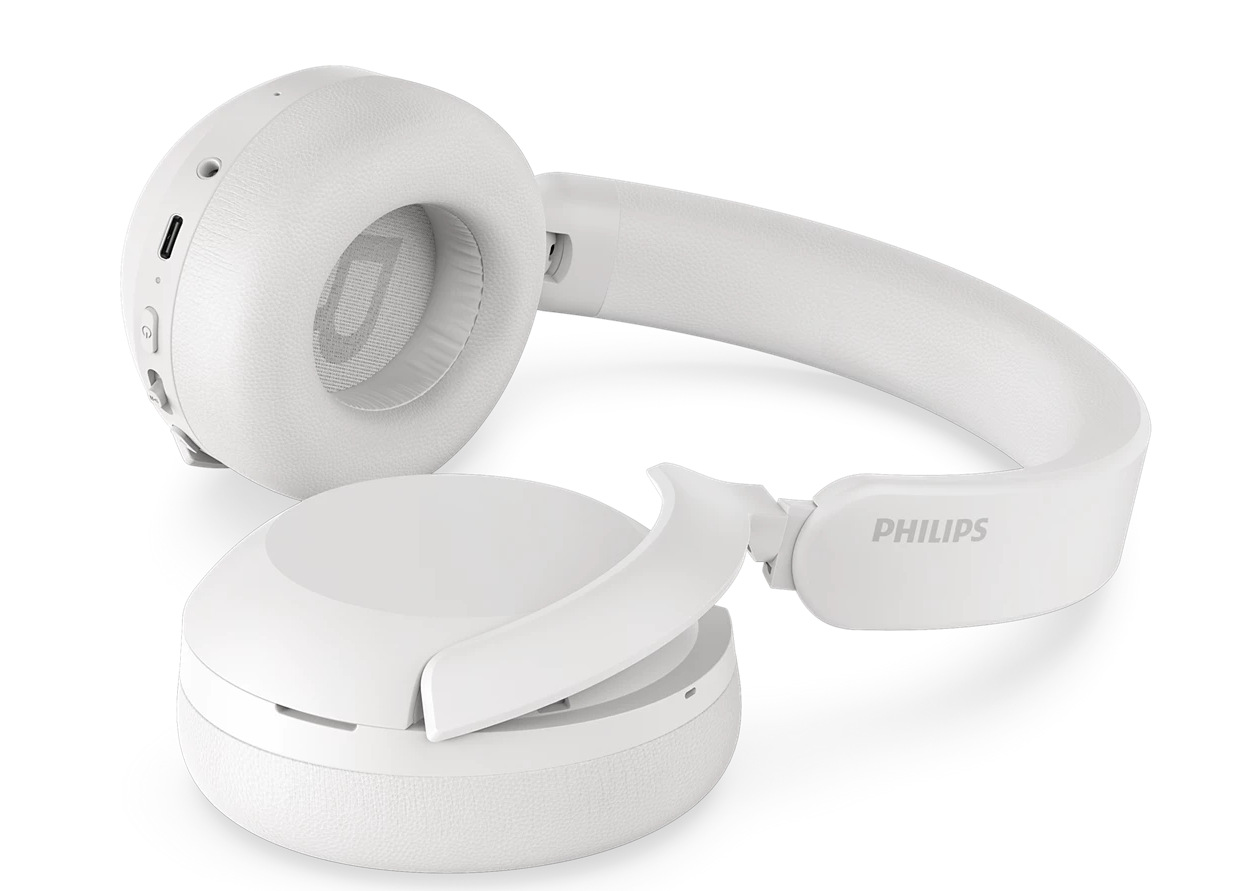 Białe słuchawki Philips na białej powierzchni. Jeden nausznik jest złożony. Nazwa marki jest widoczna na pałąku.