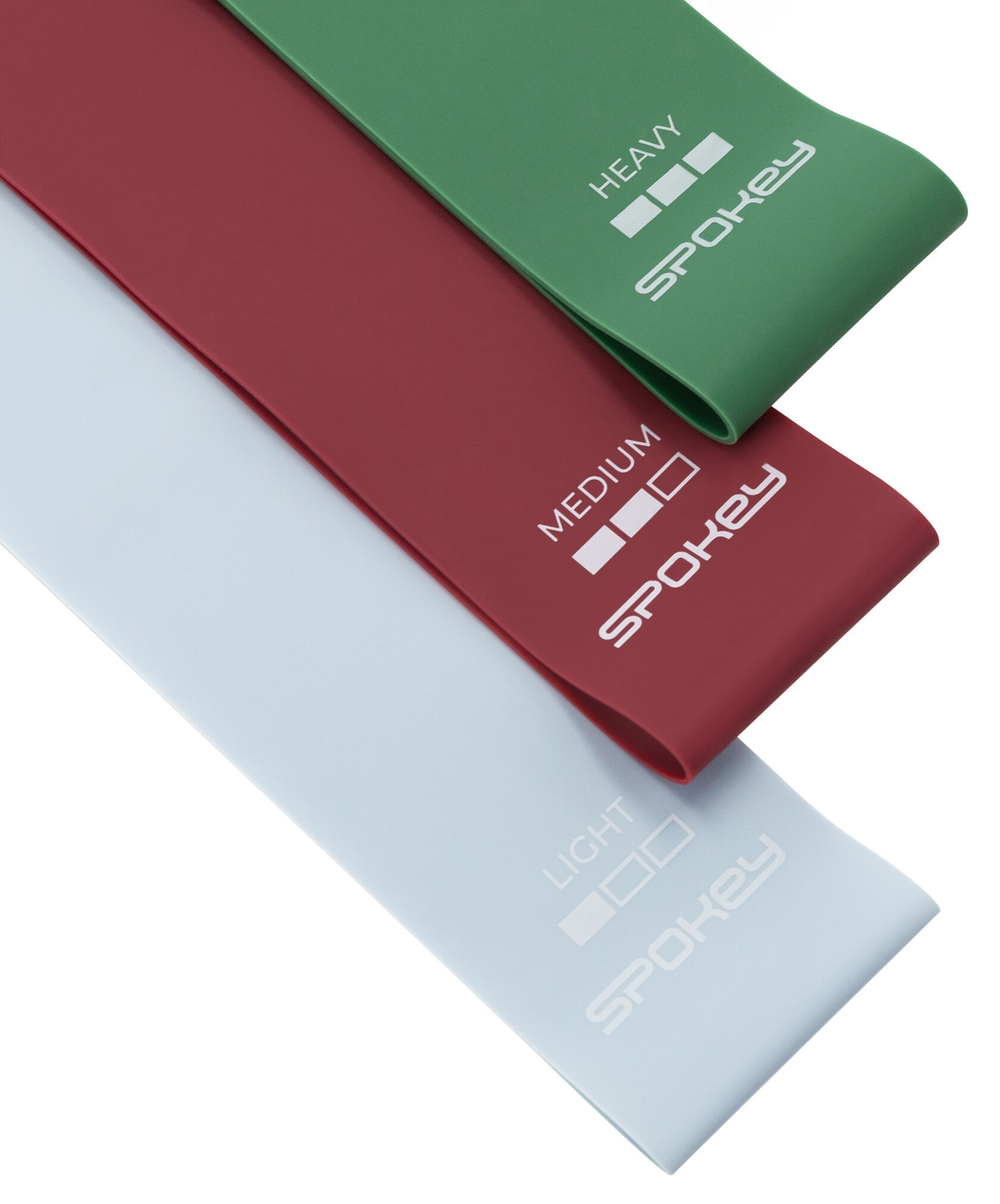 Trzy taśmy oporowe w kolorach zielonym, czerwonym i jasnoniebieskim. Każda taśma ma inny poziom oporu.