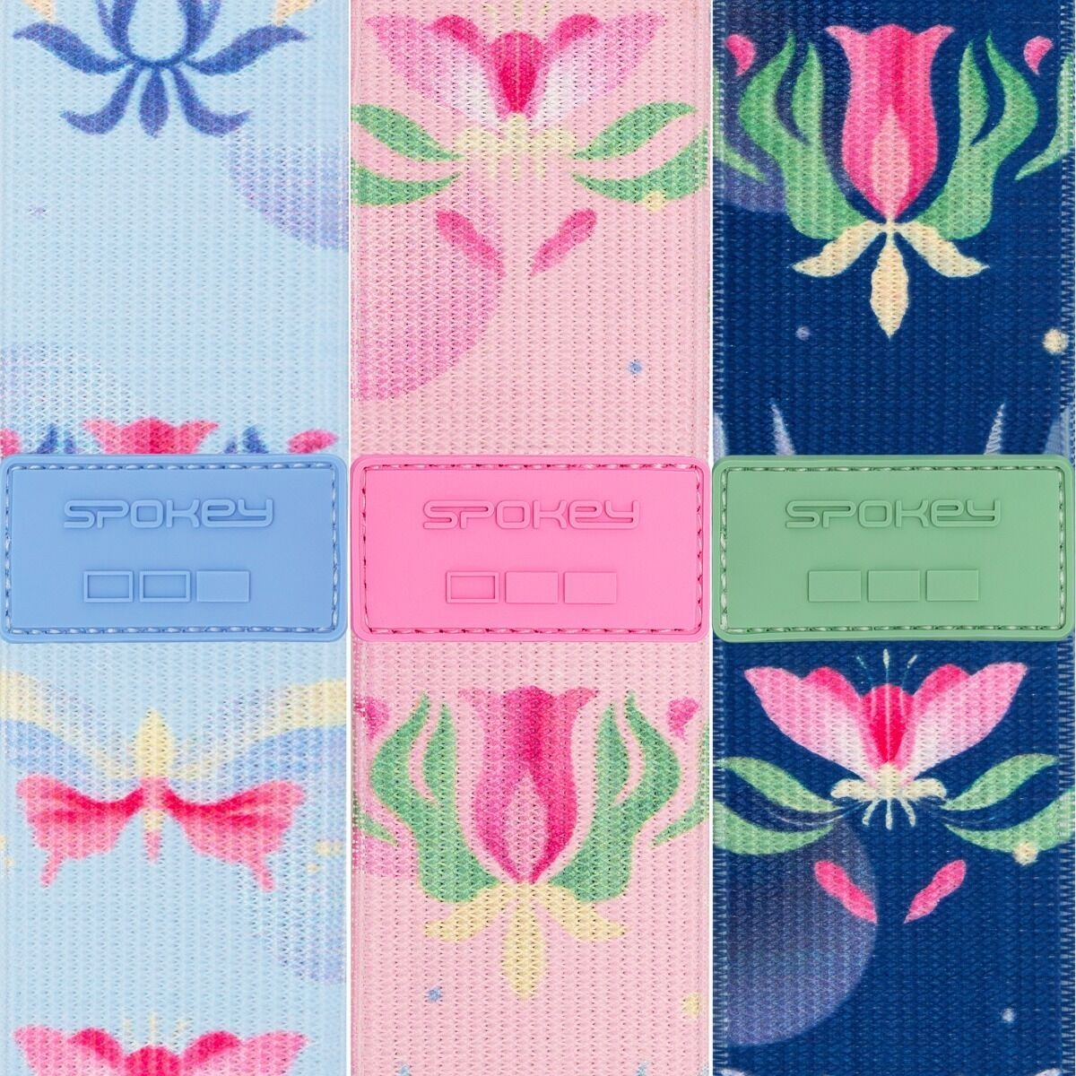 Kolorowe paski z wzorami z etykietami 'Spokey' w kolorze niebieskim, różowym i zielonym. Wzory kwiatowe i geometryczne zdobią paski.
