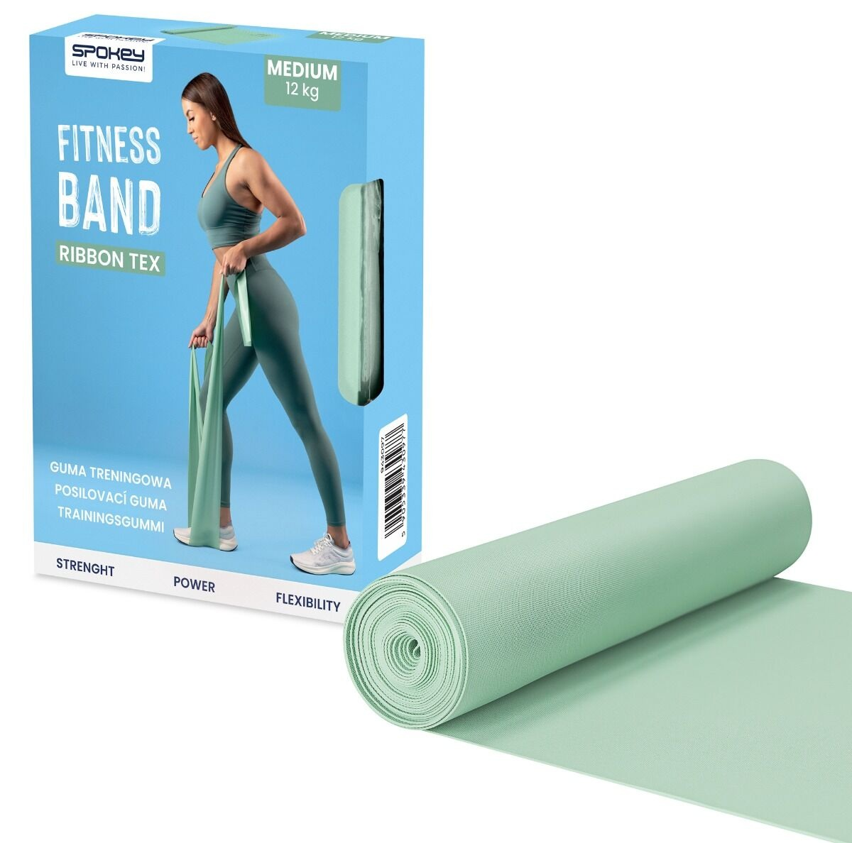 Kobieta ćwiczy z taśmą fitness. Zielona mata do ćwiczeń na pierwszym planie. Pudełko pokazuje nazwę produktu i markę.