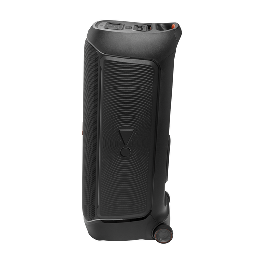 Czarny głośnik JBL na czarnym tle. Głośnik ma panel sterowania na górze, logo pośrodku i koło.