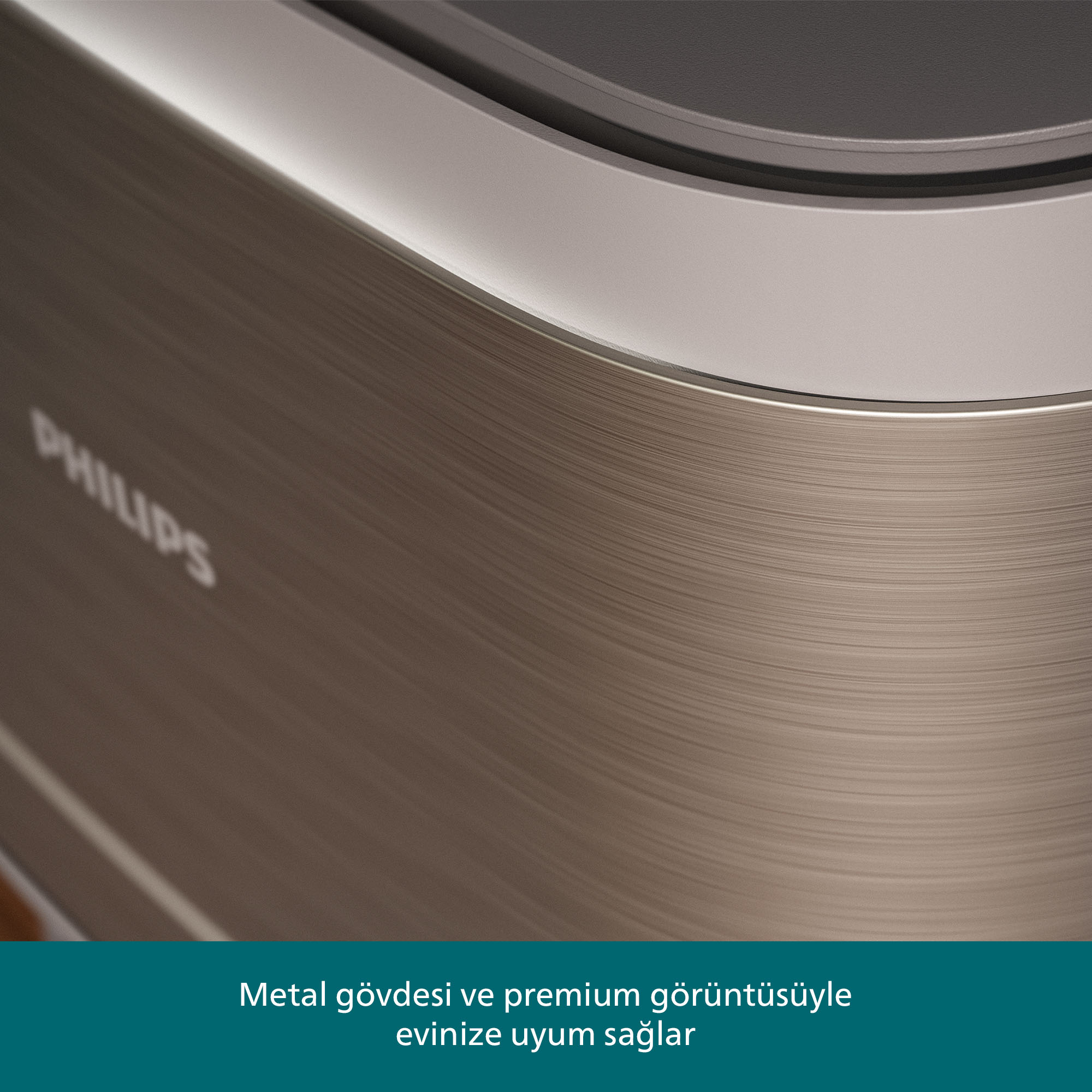 Philips logosu ve kıvrımlı tasarıma sahip, fırçalanmış metal yüzeyin yakın çekimi, premium görünüm.