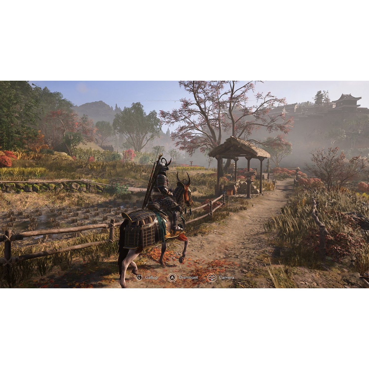A samurai on a horse gallops through a Japanese landscape. A wooden gazebo and a building are in the background.