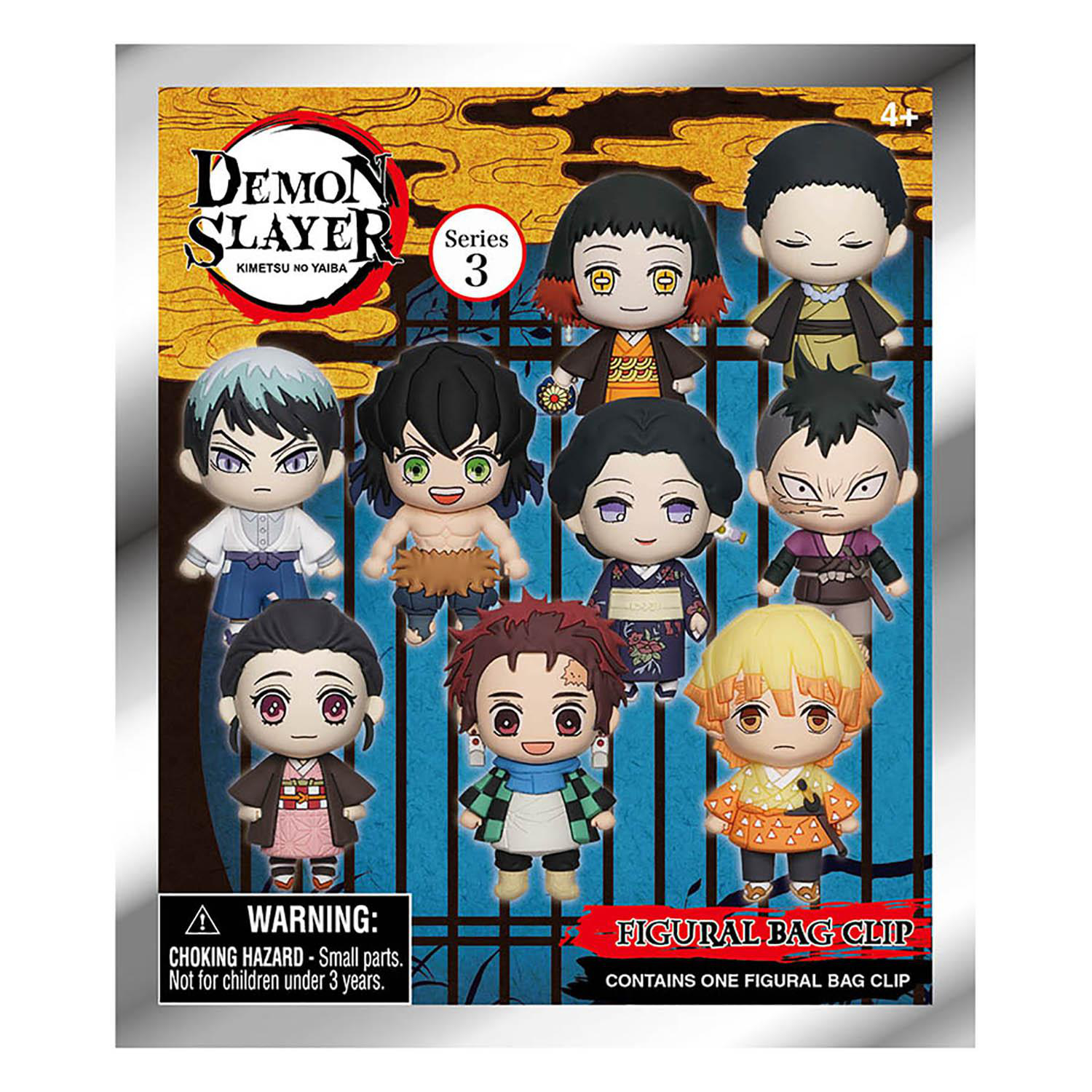 Eine Schachtel mit Demon Slayer-Figuren. Enthält Charaktere mit verschiedenen Haarfarben und Outfits. Es ist ein figuraler Beutelclip.