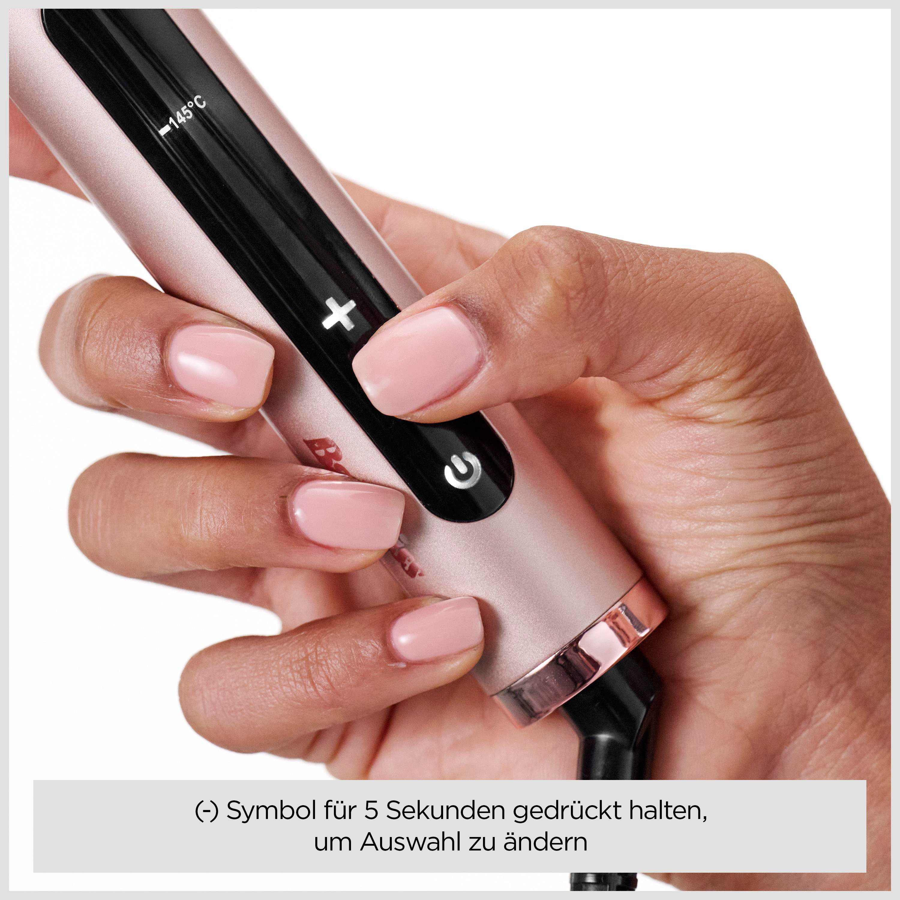 Eine Hand hält ein roségoldenes Haarstyling-Tool. Das Tool hat eine Temperaturanzeige und einen Ein-/Ausschalter.
