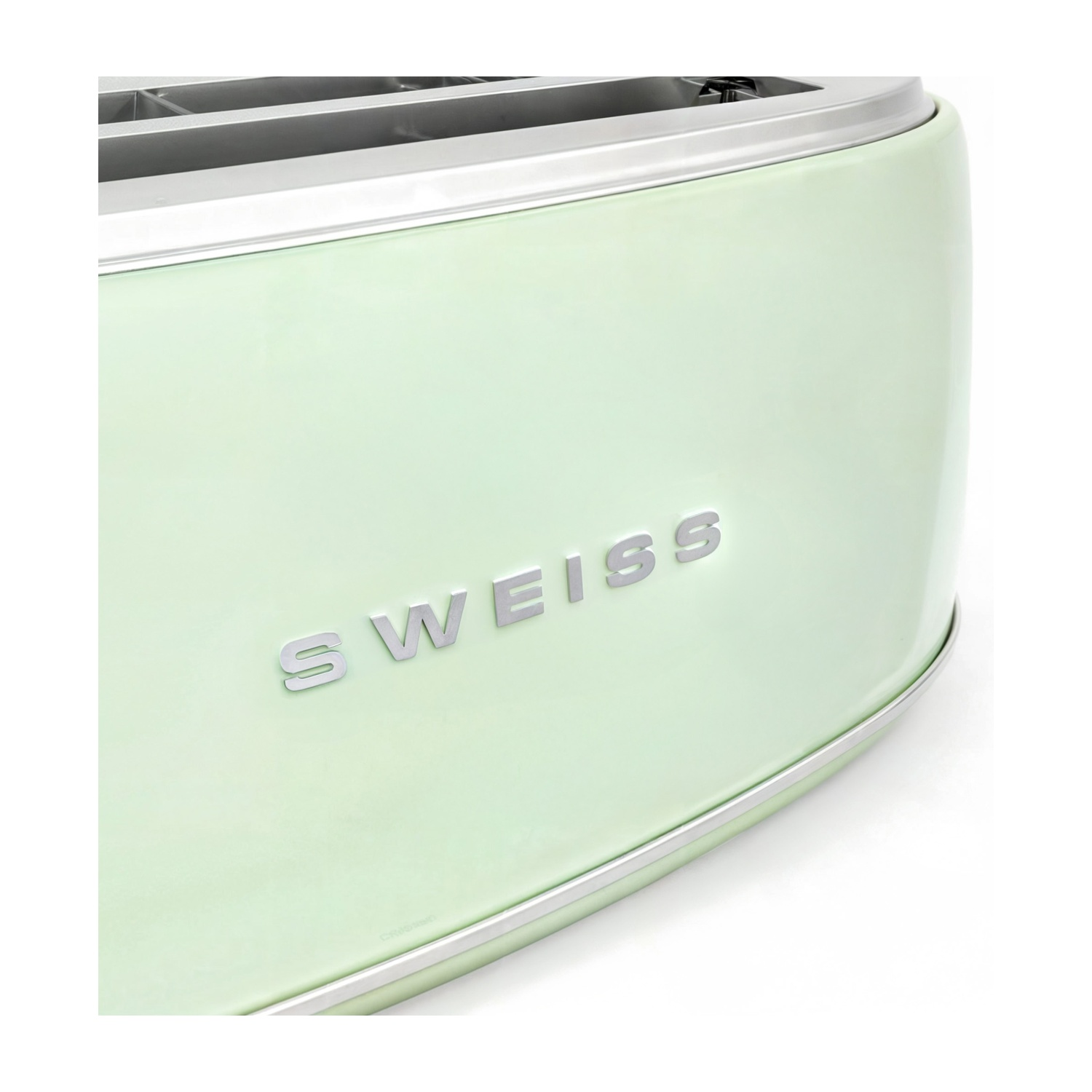 Primo piano di un tostapane verde menta con la scritta "SWEISS" in lettere argentate. La parte superiore è argentata con fessure.