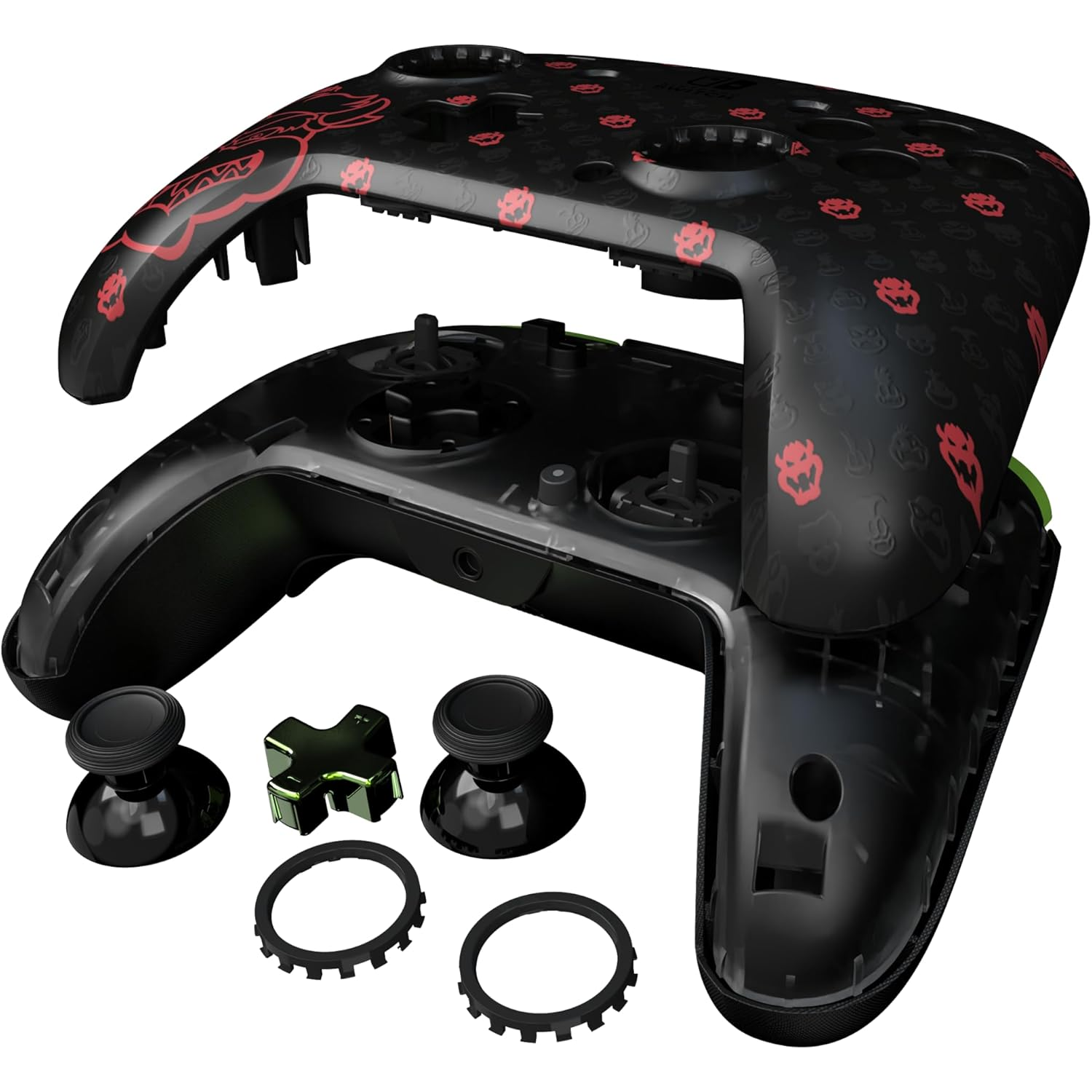 Disassembled black game controller with red character detailing. Components include joysticks, buttons, and decorative rings.