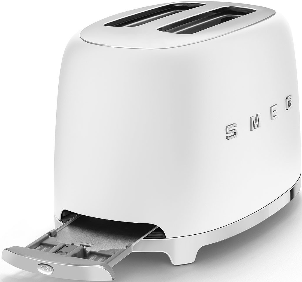 Un grille-pain SMEG blanc avec un dessus chromé et un tiroir ramasse-miettes. Le logo SMEG est visible.