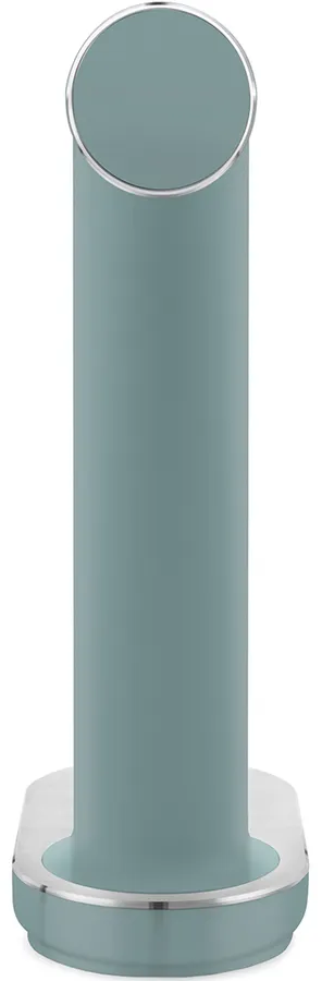 Un objet cylindrique de couleur sarcelle, avec un bord argenté en haut et en bas. La base est ovale, également avec une bordure argentée.