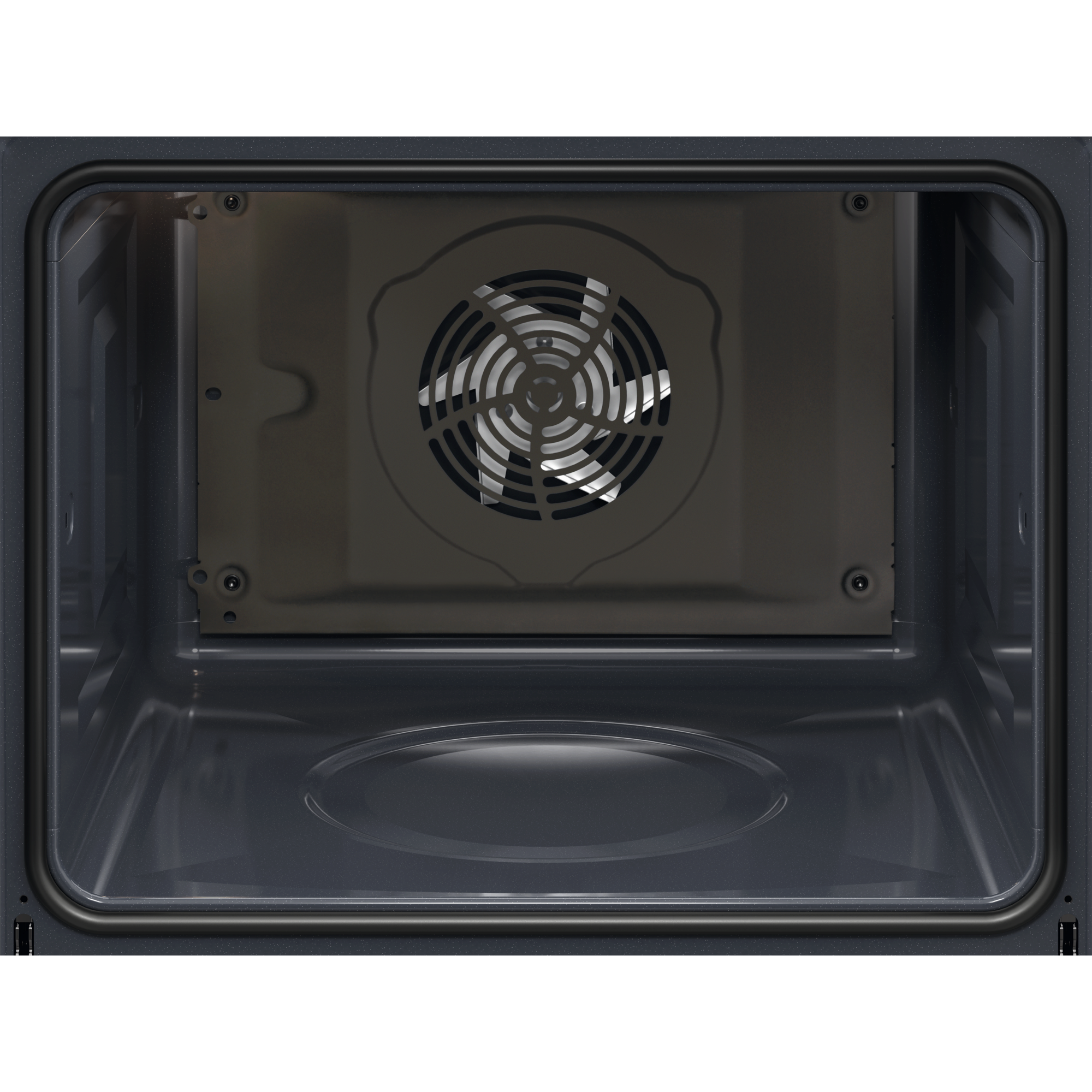 Widok wewnątrz piekarnika. Z tyłu widoczny wentylator, z ciemnym wnętrzem. Widoczna jest również rama drzwi piekarnika.