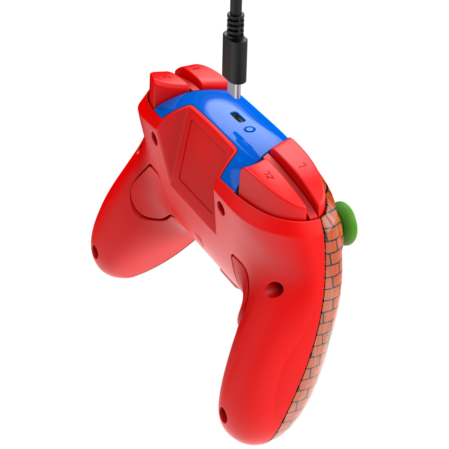 Manette de jeu rouge et bleue avec un cordon noir branché. La manette a un bouton vert et un motif de briques.