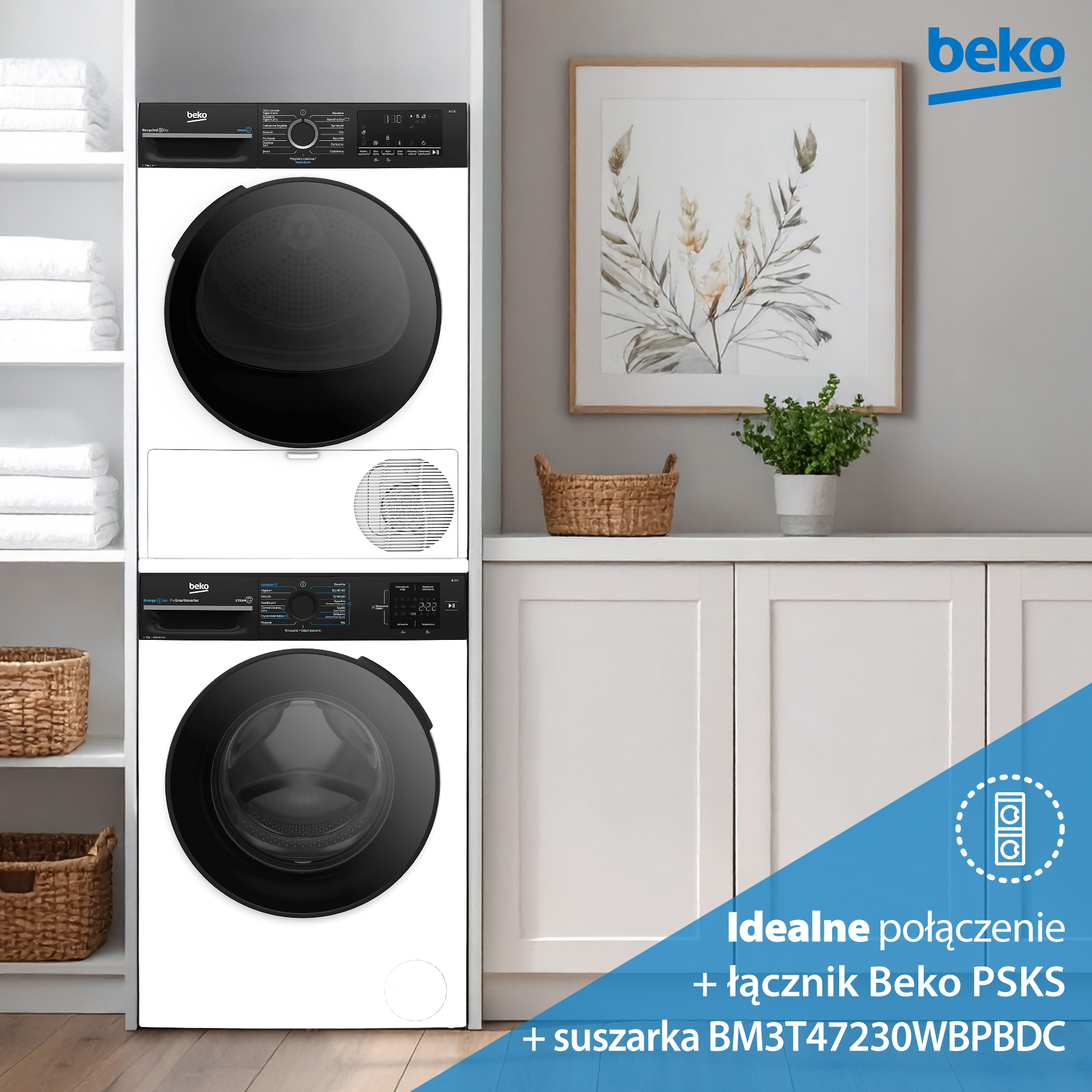 Ułożona w stos pralka i suszarka Beko w kolorze białym i czarnym. Obraz i roślina na białej szafce. Widoczne ręczniki i kosze.