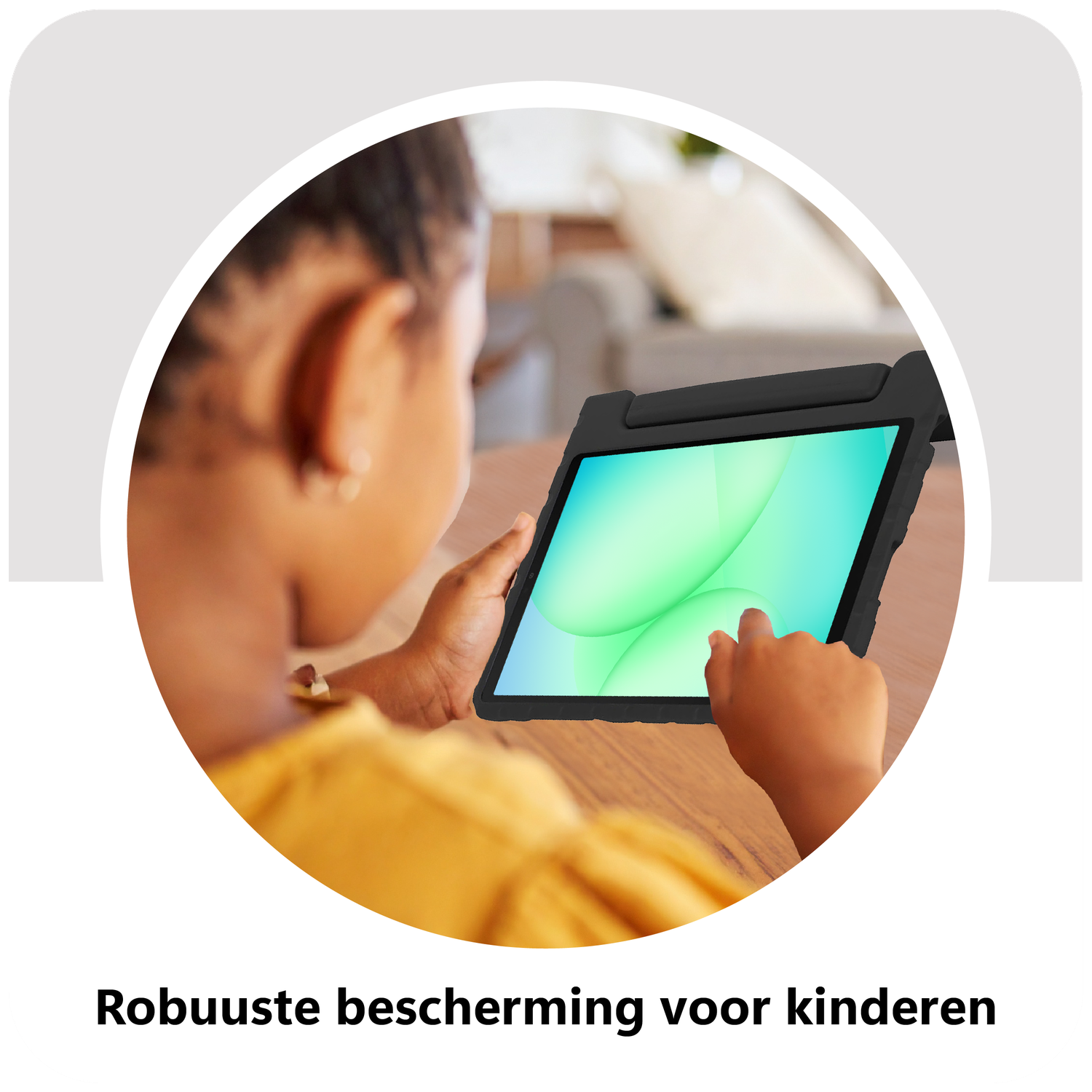 A child is using a tablet. The tablet is in a black case. The screen shows green and blue colors. The child is wearing a yellow shirt.
