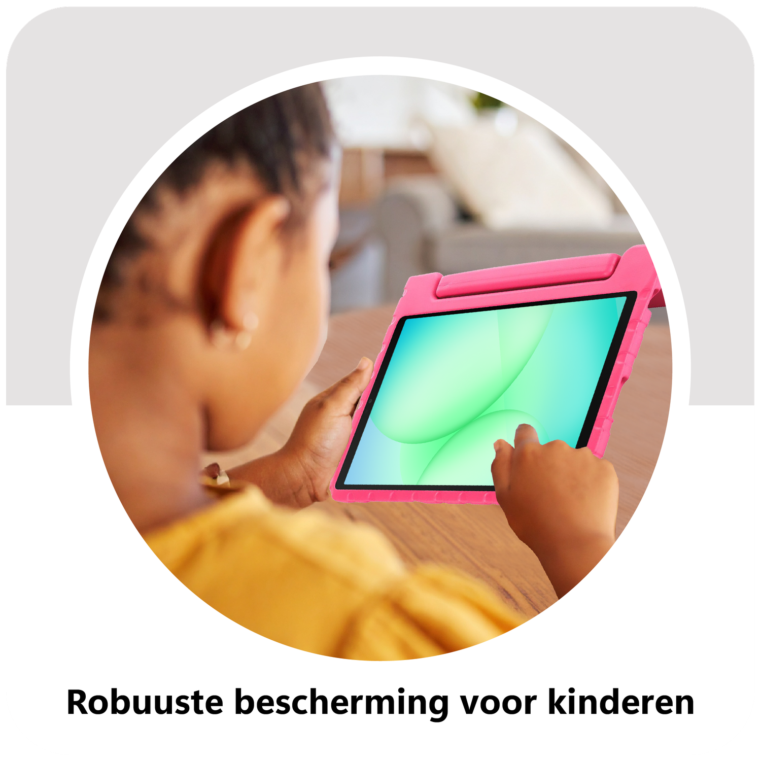 A child holds a tablet with a pink case. The screen shows a green and blue design. The child's arm and face are visible.