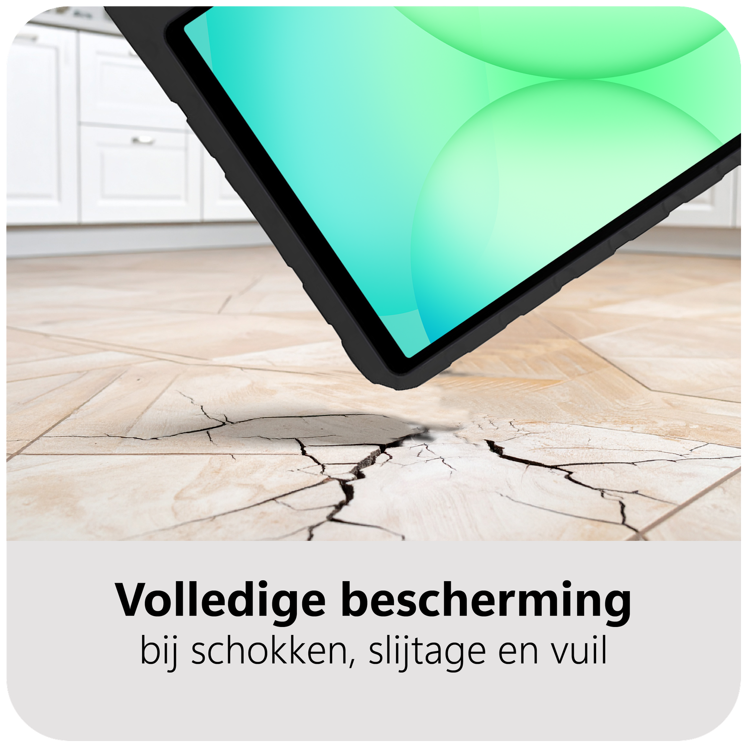 Tablet with a black case above cracked floor. Background shows white cabinets. Text: Complete protection against shocks, wear, and dirt.