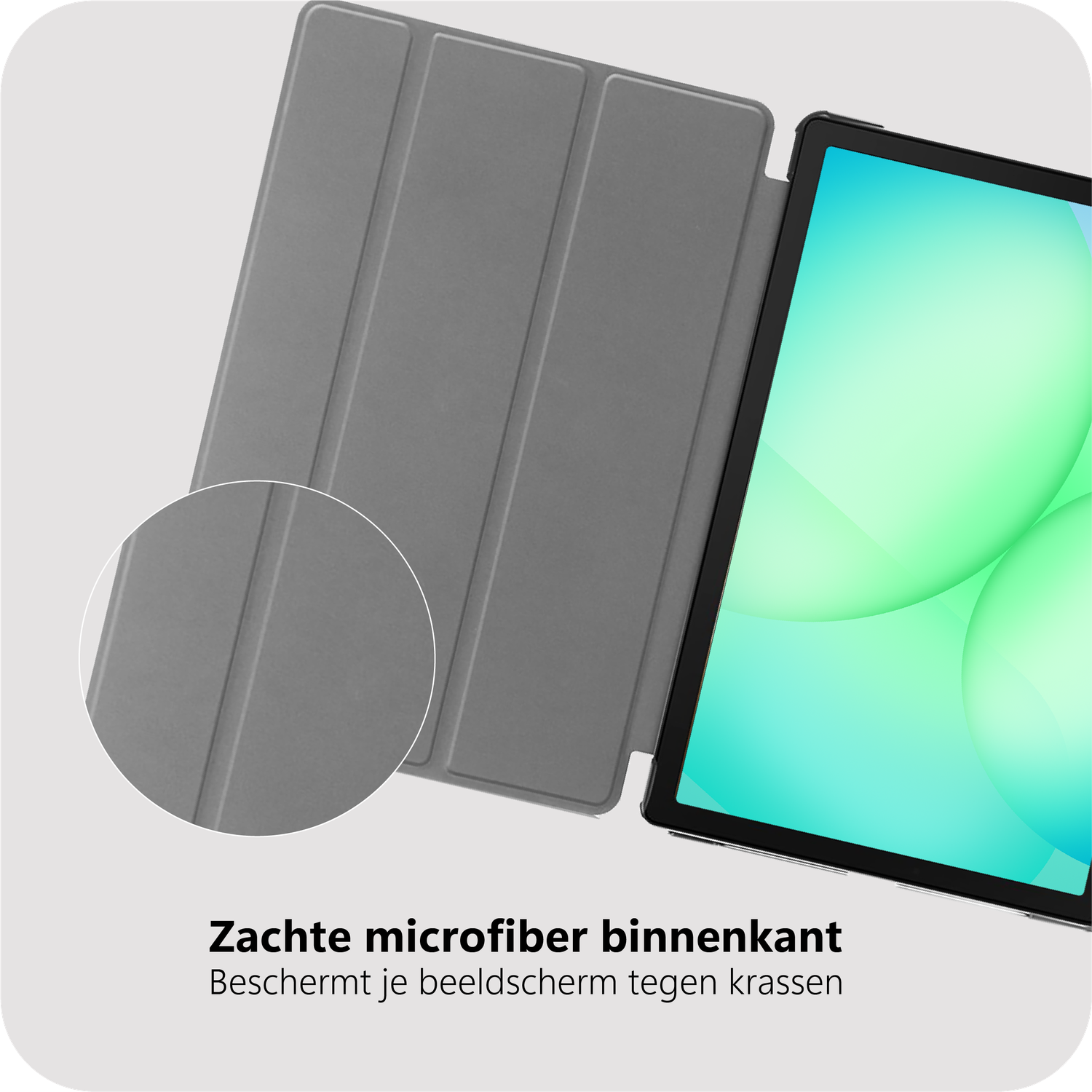 A gray tablet case is open next to a tablet showing a green gradient screen. The text in the image says 'Soft microfiber interior'.