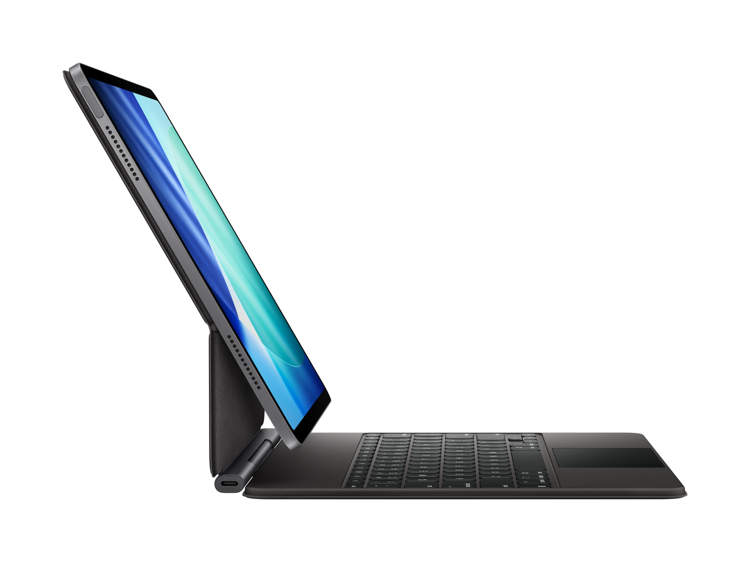 Un iPad Pro con una funda de teclado negra. La pantalla muestra un degradado azul y verde. El fondo es blanco.