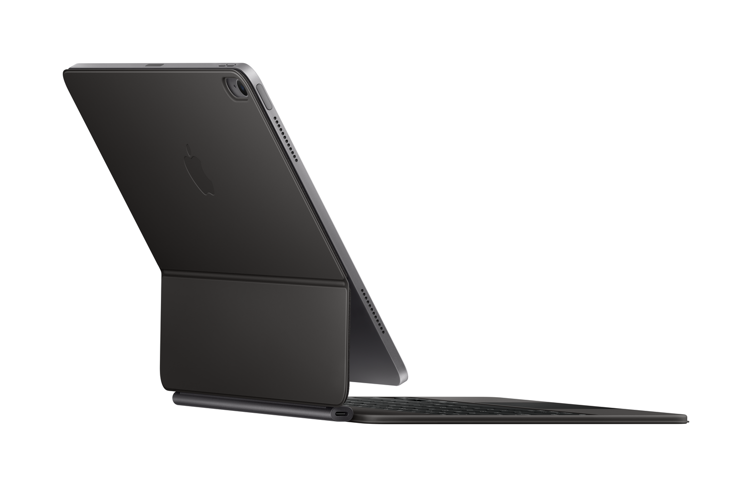Un iPad Pro negro de Apple con funda de teclado está abierto, en ángulo. El logotipo de Apple es visible. El fondo es blanco.