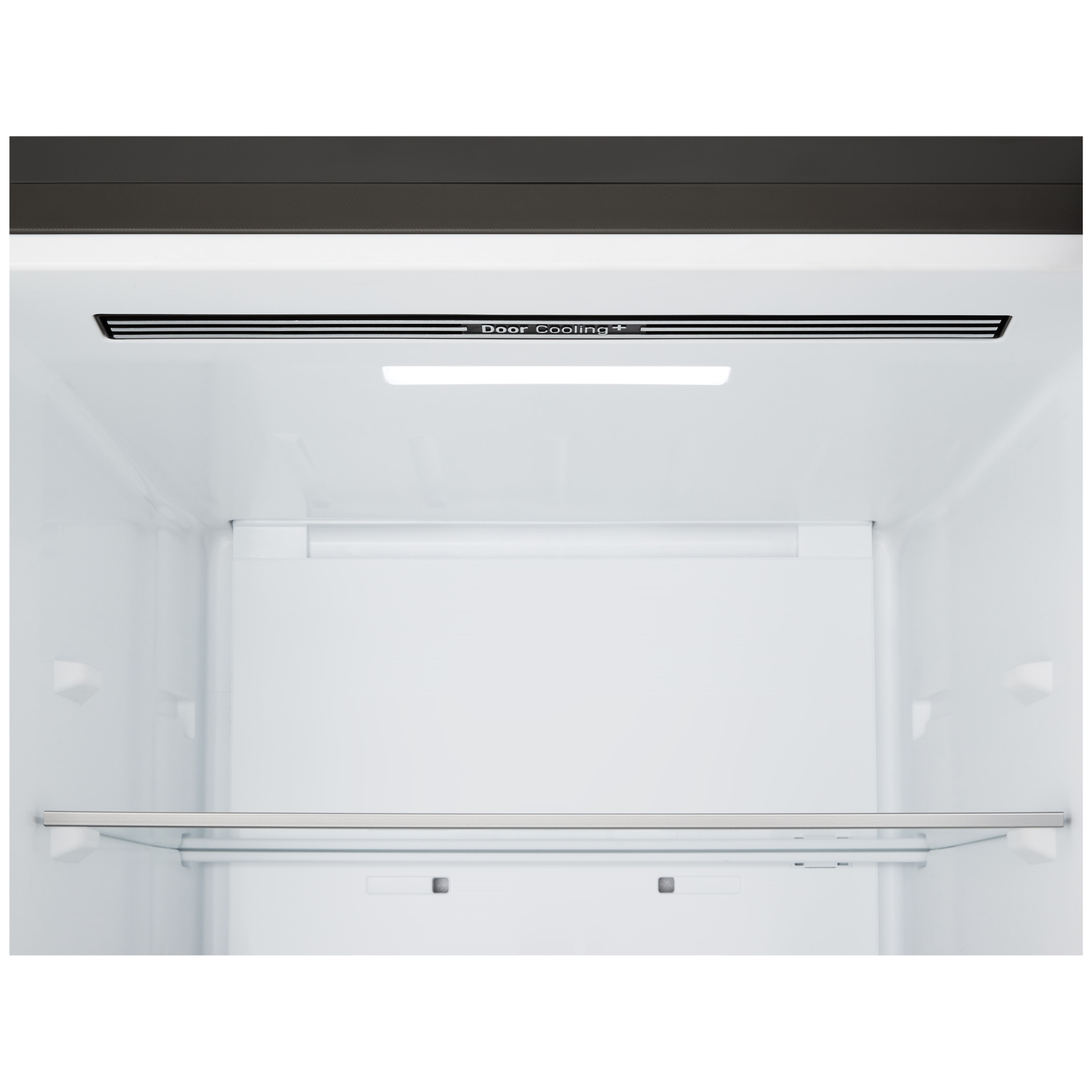 Inside a refrigerator, white interior with a shelf. 'Door Cooling+' text is visible above. Black top section.