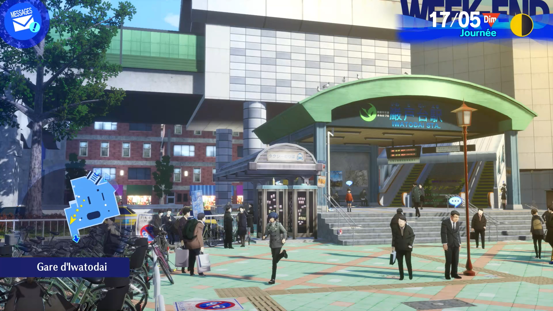 Scène à la gare d'Iwatodai avec des personnes, une structure verte et un bâtiment. La date est le 17/05. Une carte et une icône de message sont visibles.