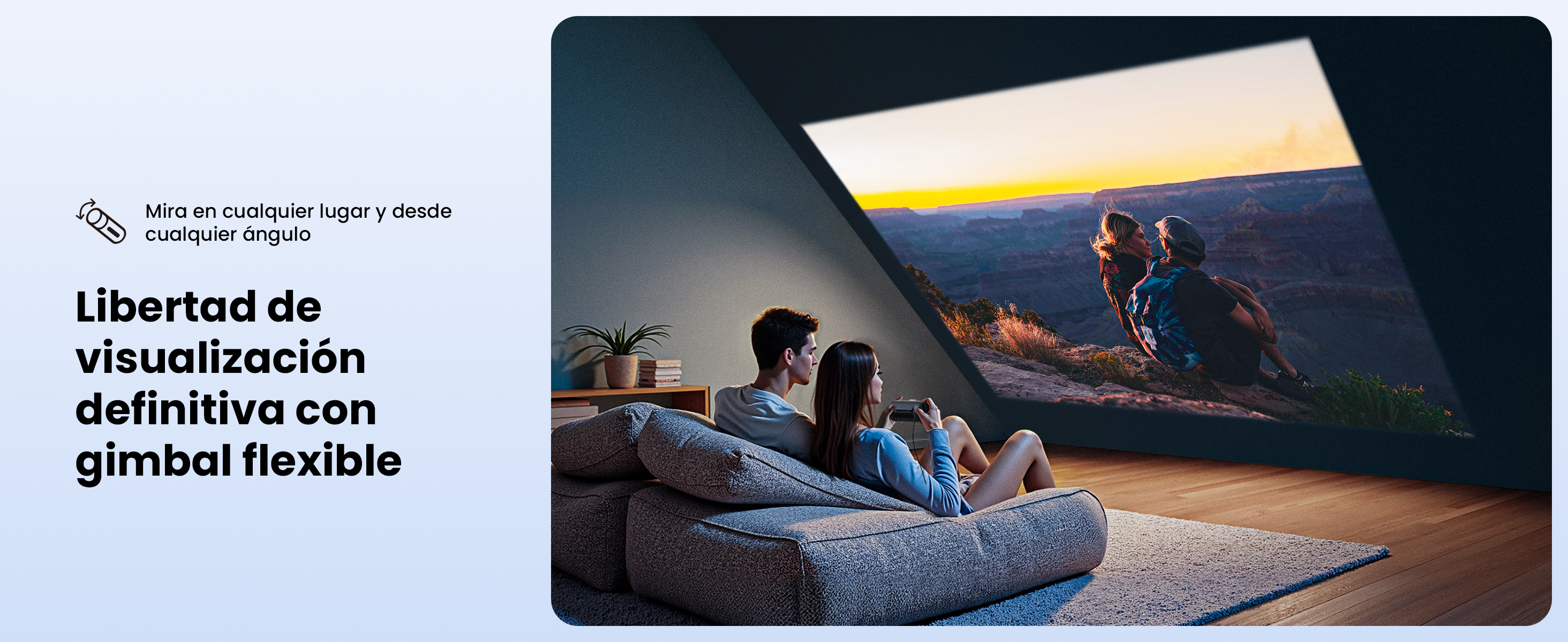 Una pareja ve la puesta de sol en una pantalla. Se sientan en un sofá en una habitación. El texto dice 'Libertad de visualización'.