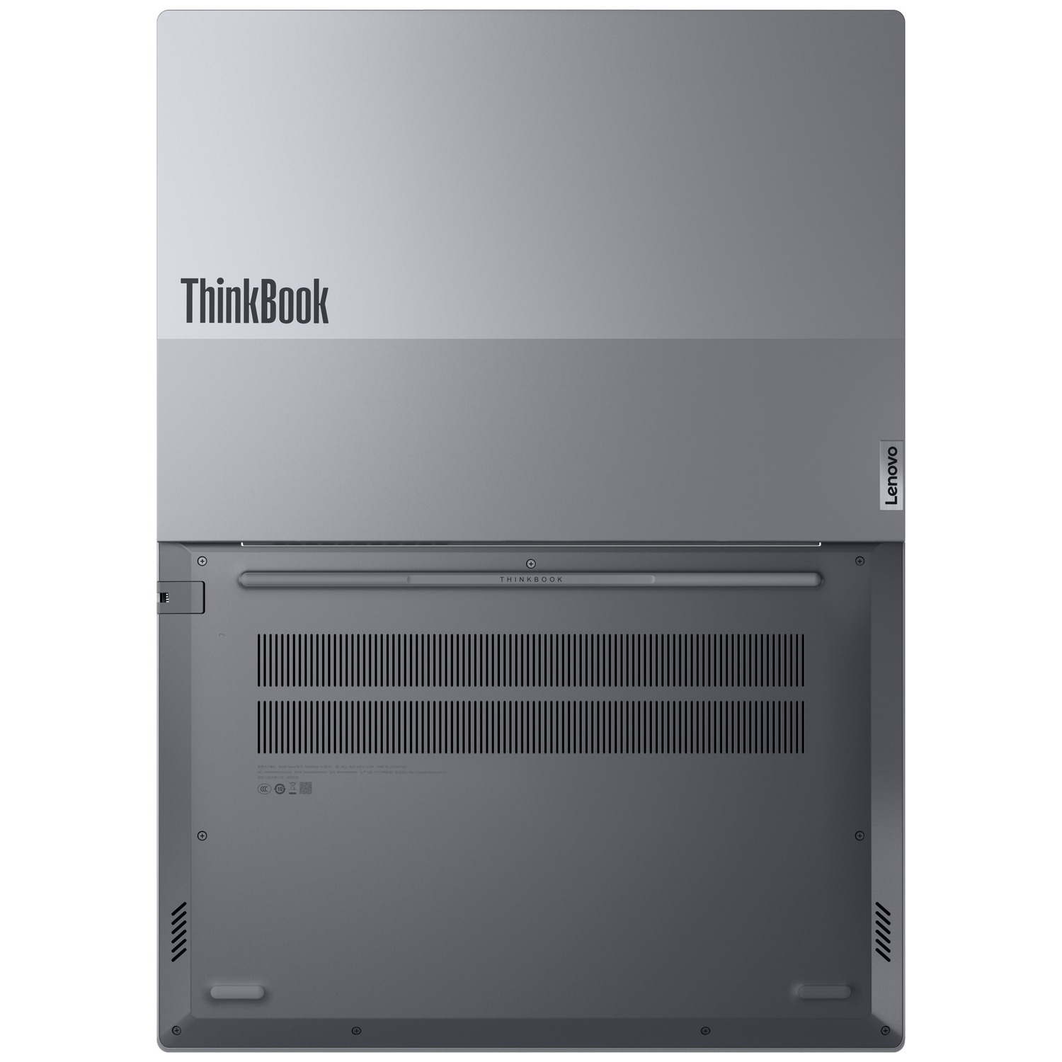Top view of a silver Lenovo ThinkBook laptop. The ThinkBook logo is visible, along with the Lenovo brand. The bottom has air vents.