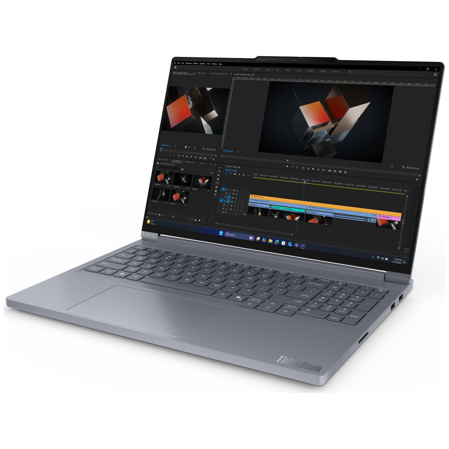 A gray ThinkBook laptop is open, displaying video editing software. The screen shows a timeline and video preview.