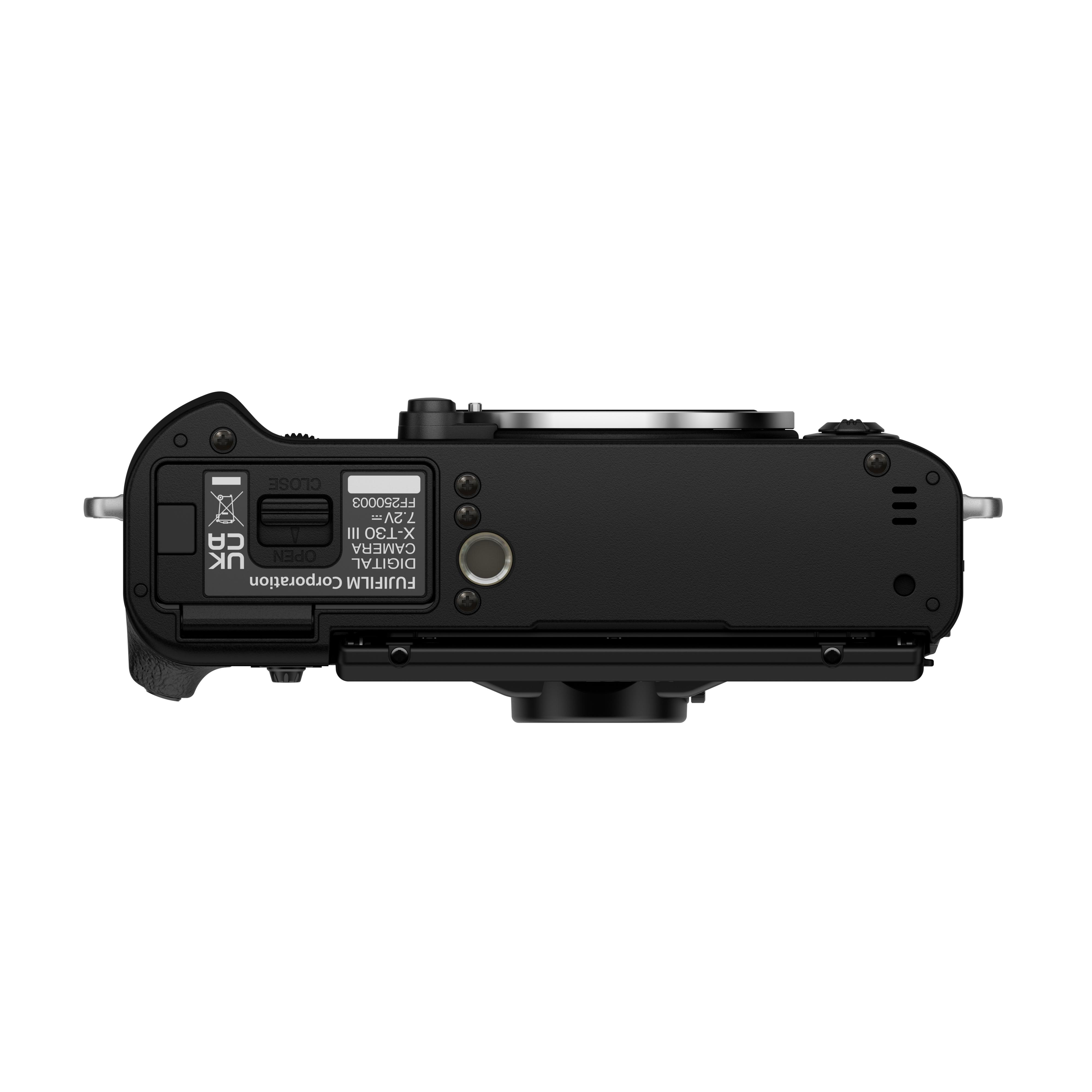Draufsicht auf eine schwarze Fujifilm X-T30 III Kamera. Details umfassen Etiketten, Knöpfe und Anschlüsse.