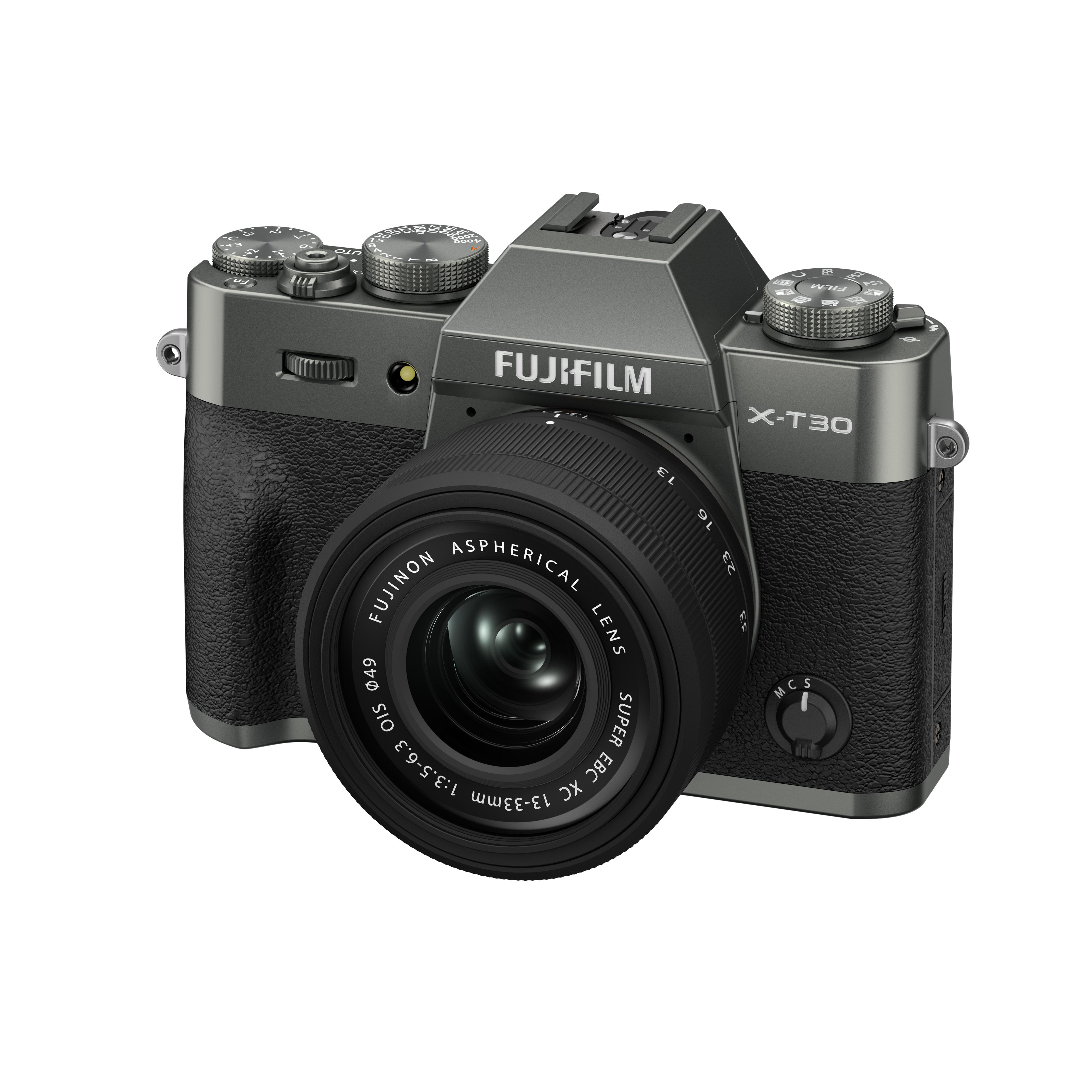 Eine graue Fujifilm X-T30 Kamera mit schwarzem Objektiv. Sie ist auf weißem Hintergrund.