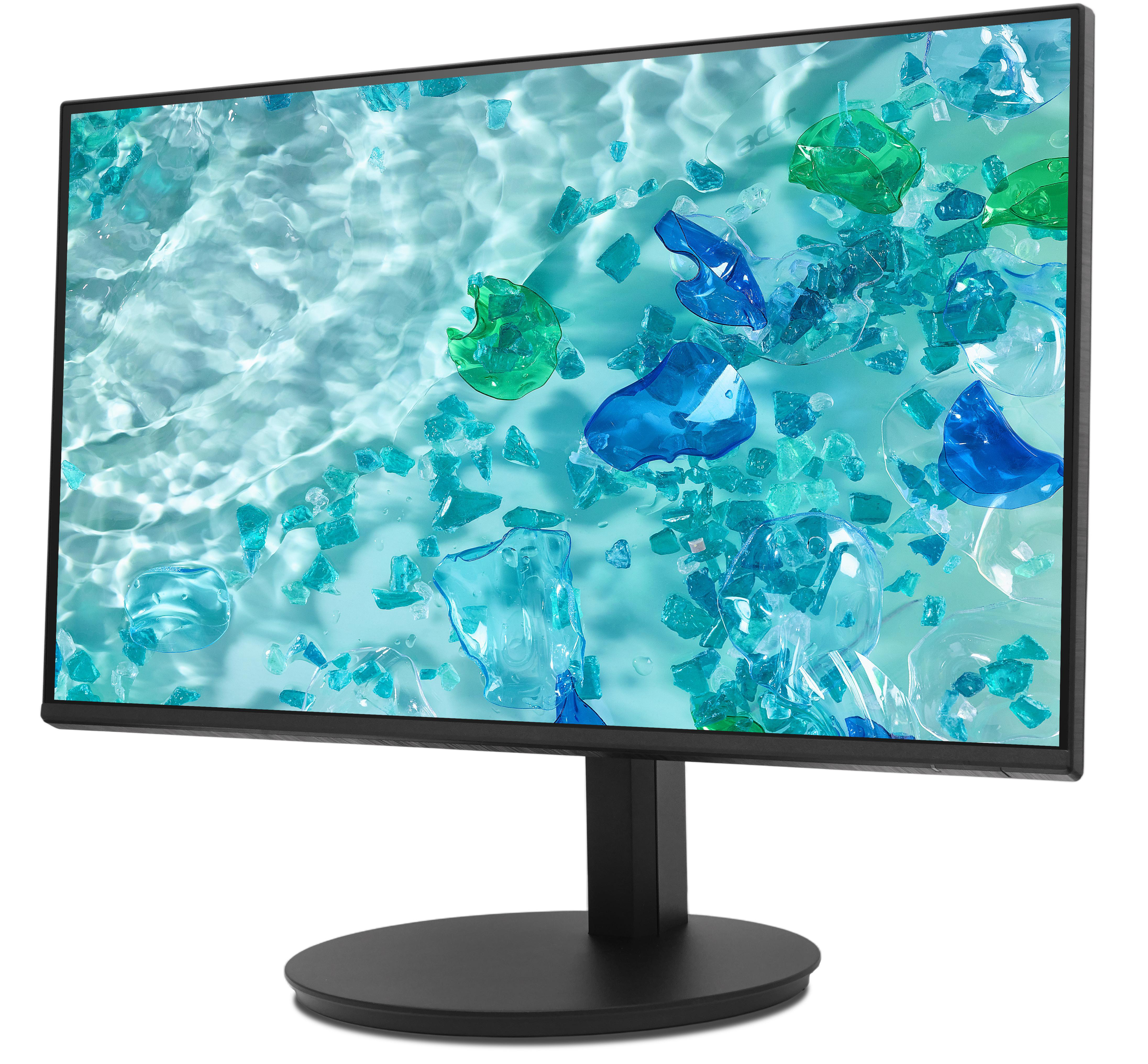 Monitor mit abstraktem Wassermotiv mit blauen und grünen Kristallen. Der Monitor ist schwarz, auf einem schwarzen Ständer.