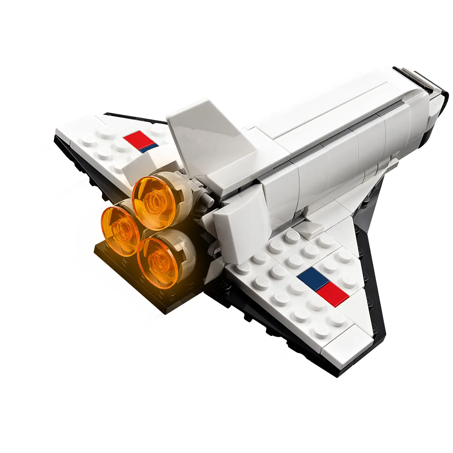 A white Lego space shuttle model with orange engine lights. It has red and blue accents on the wings. The background is white.