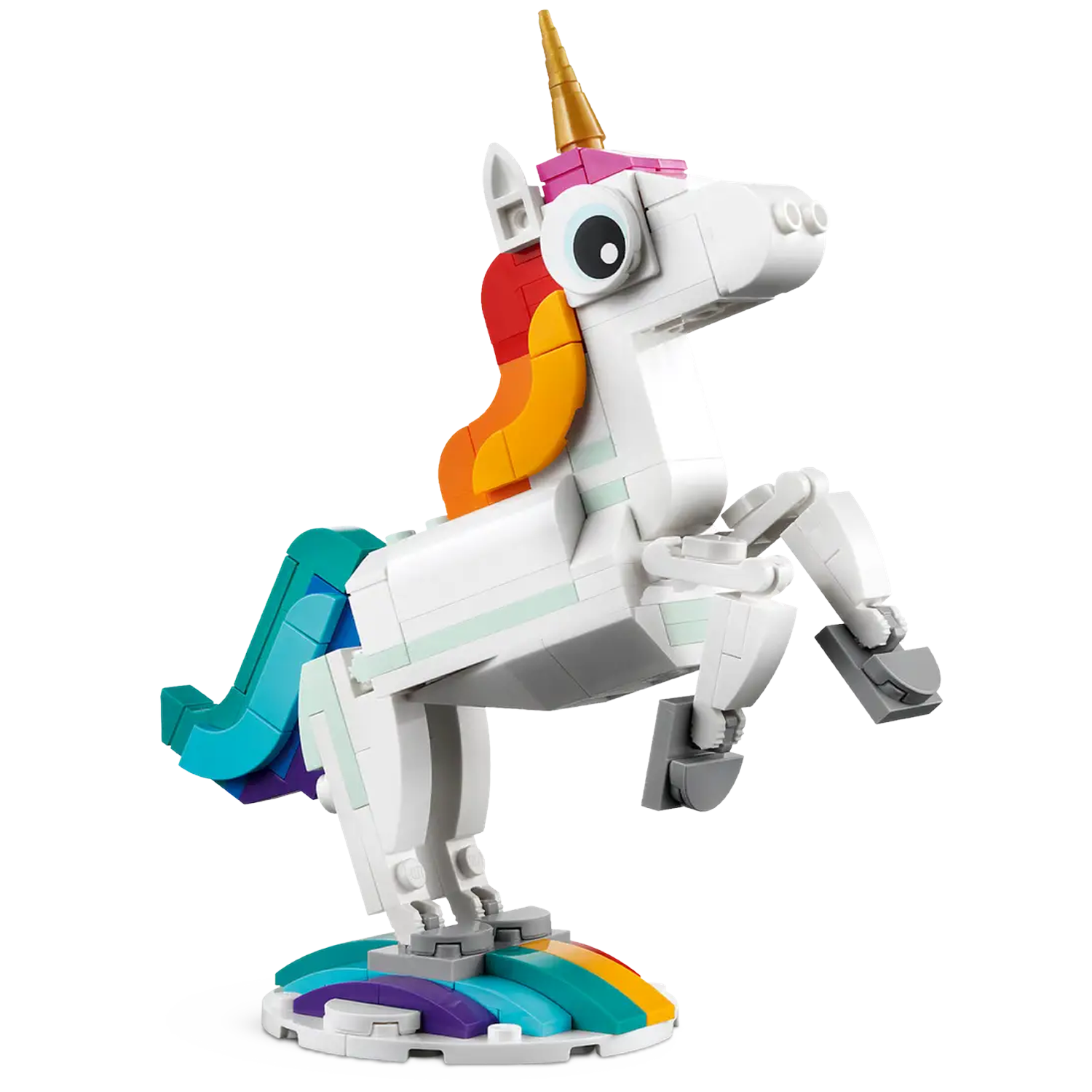 A white Lego unicorn with a golden horn and colorful mane. It stands on a rainbow-colored base with one leg raised.
