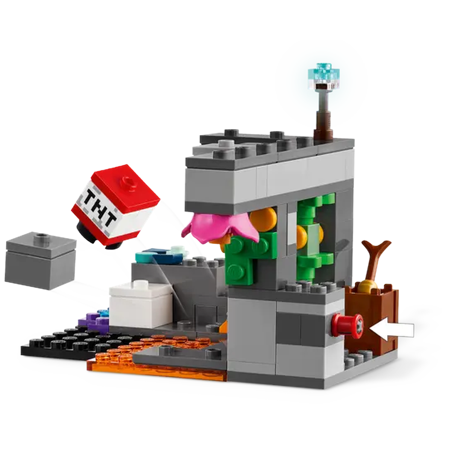 Lego set die een Minecraft scène uitbeeldt. Bevat een TNT blok, grijze blokken, een structuur met roze bloem, groene planten en een licht.